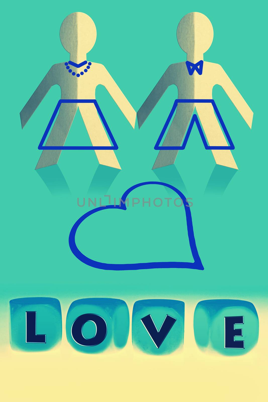 Love word on cubes in front of paper man-woman
