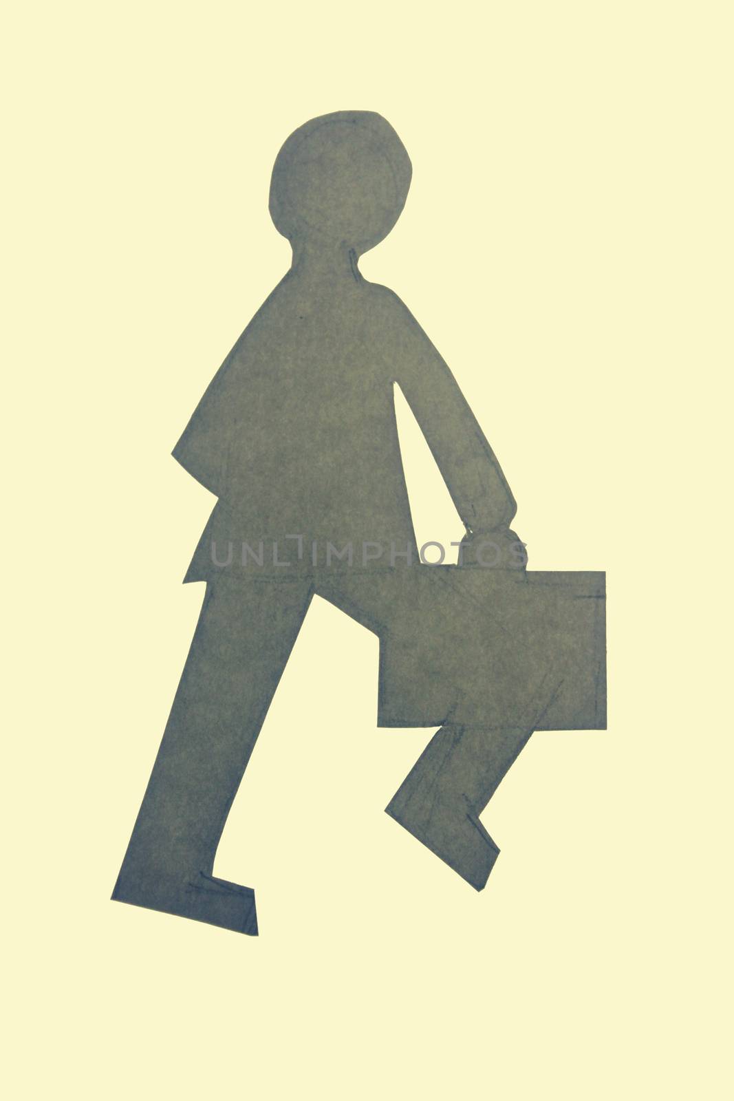Businessman walking with a briefcase by yands