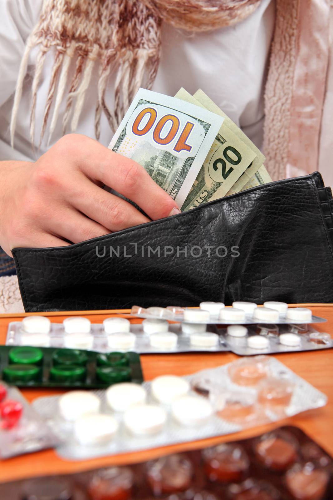 Sick Person checking the Wallet with a Money