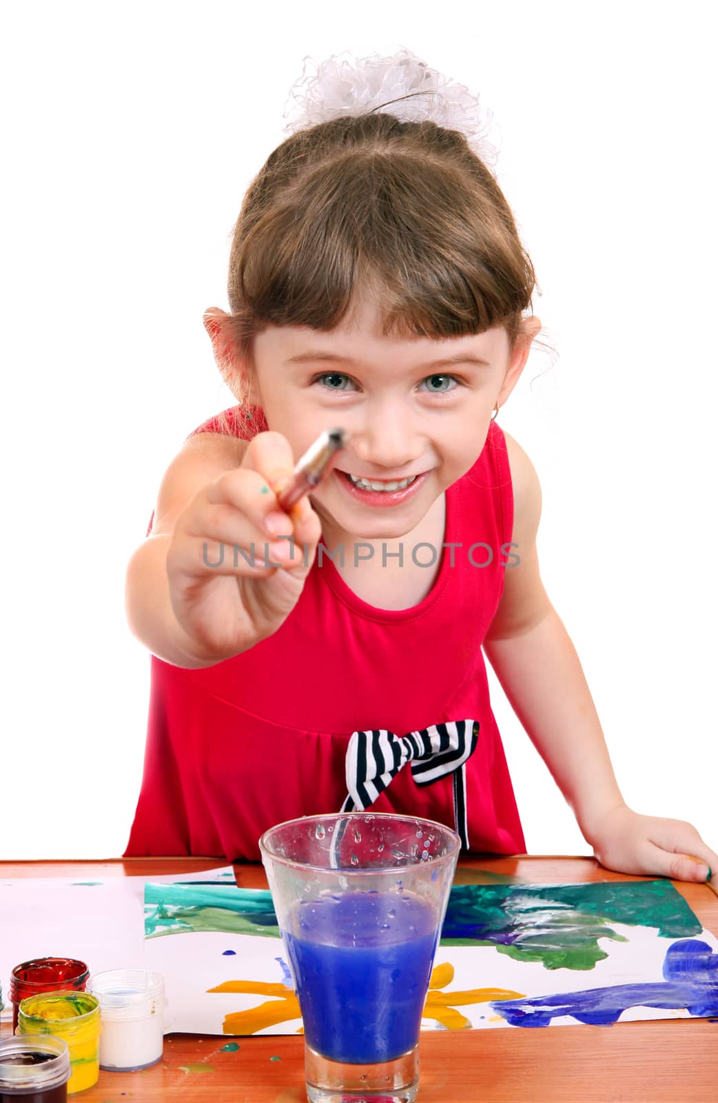 Cheerful Little Girl Drawing Isolated on the white background