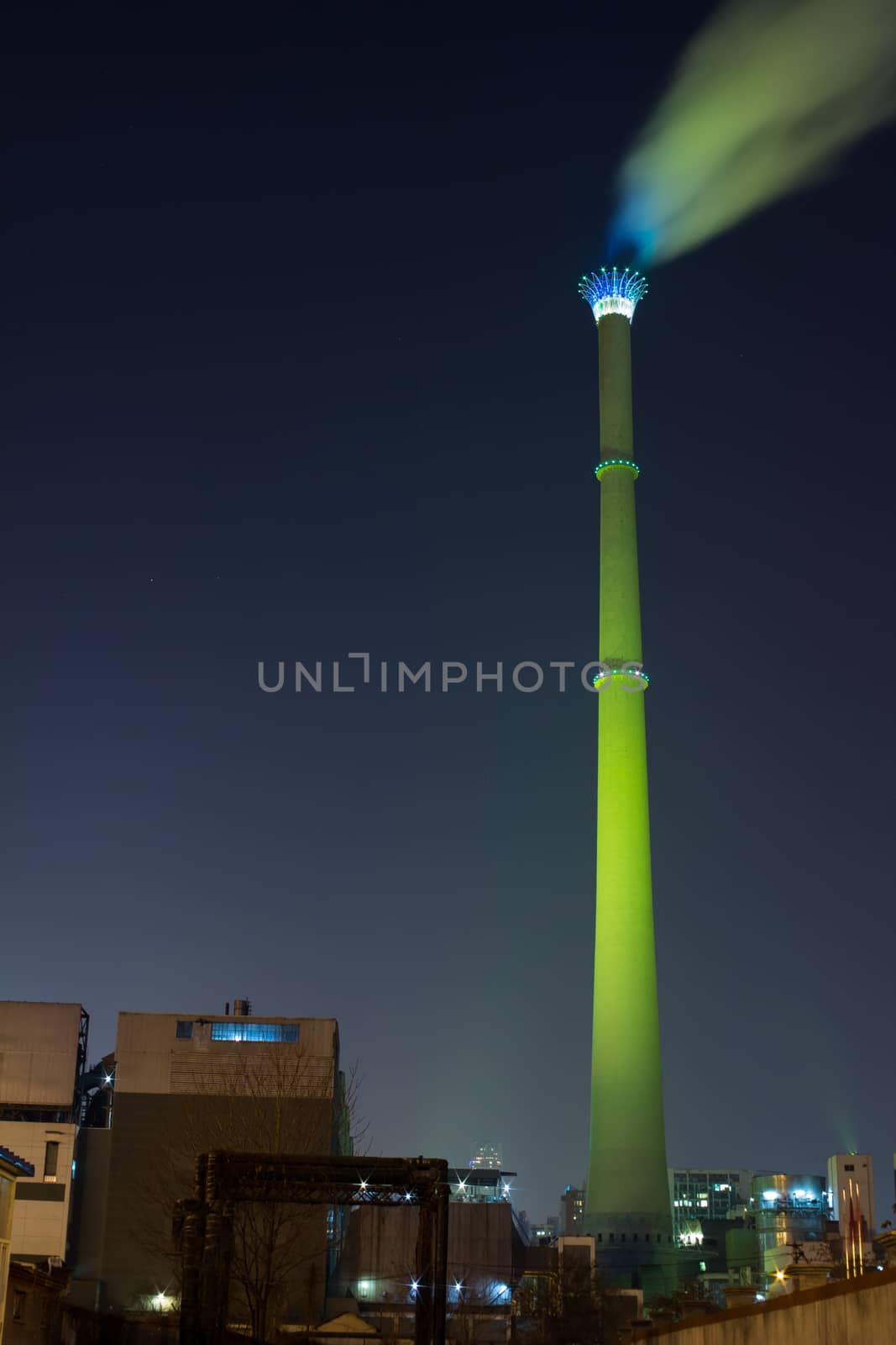 Smoking Chimney of thermal power plant in night