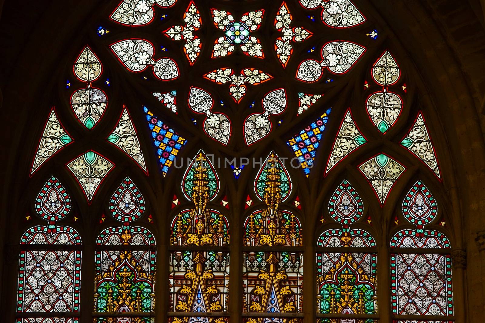 Gothic cathedral interior with decorated window