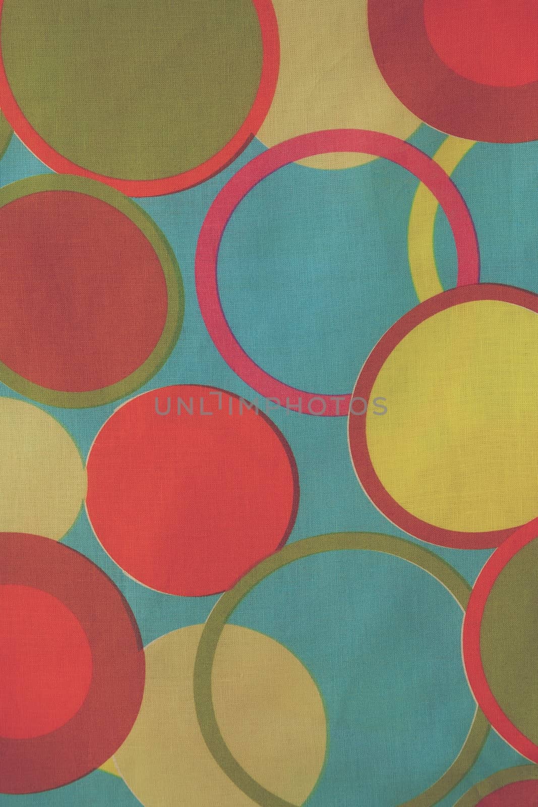Circles on a colorful fabrics by tolikoff_photography