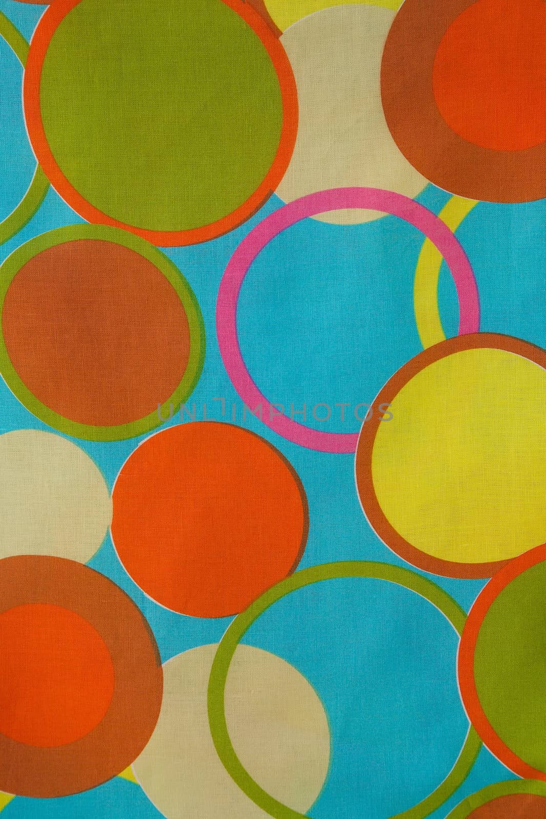 Circles on a colorful fabrics by tolikoff_photography