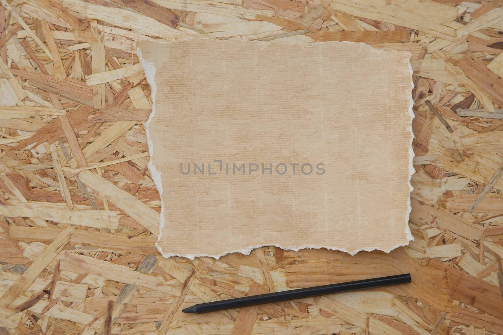 A distressed sheet of paper and a pen by tolikoff_photography