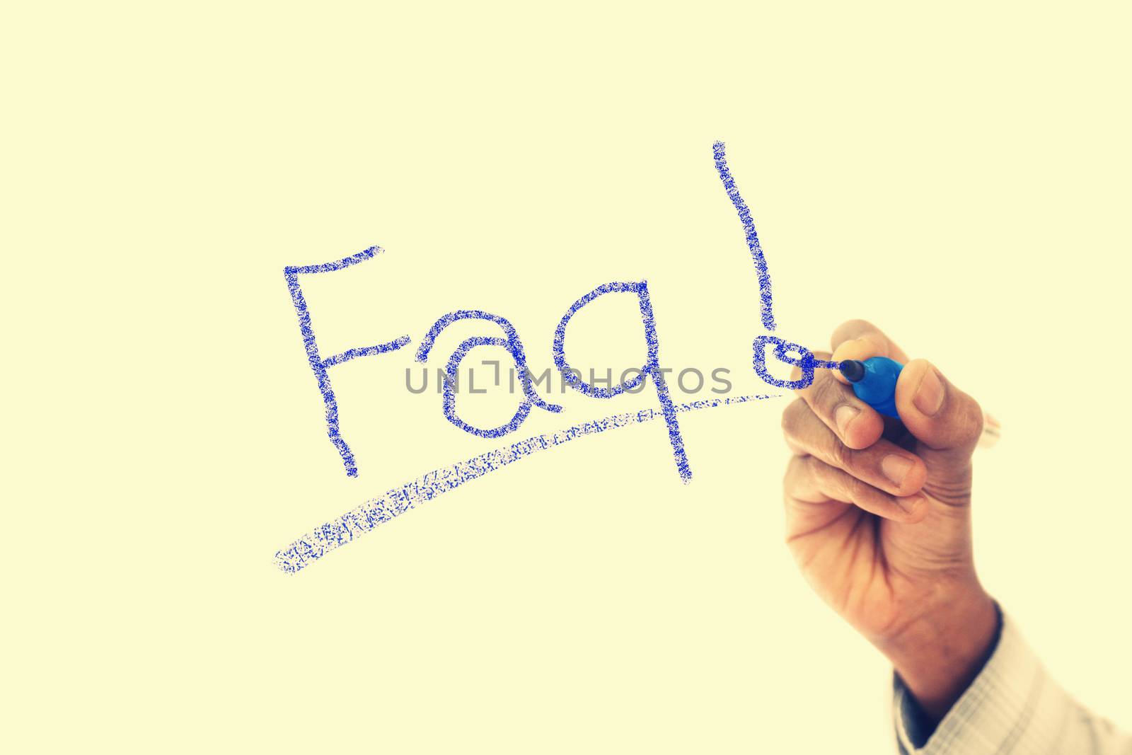 FAQ word written  on transparent wipe board by yands