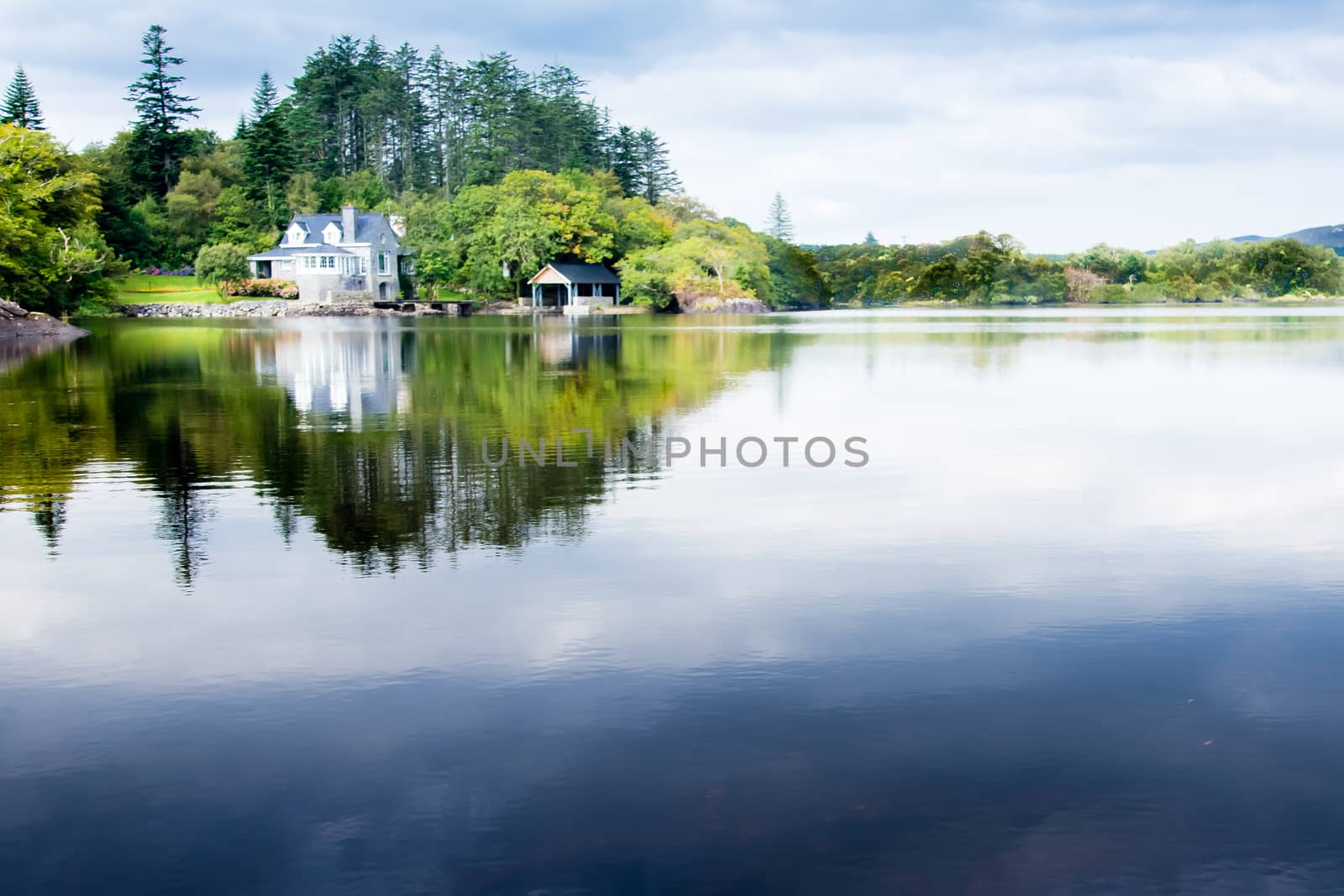 Lake house with mirrored background in Ireland