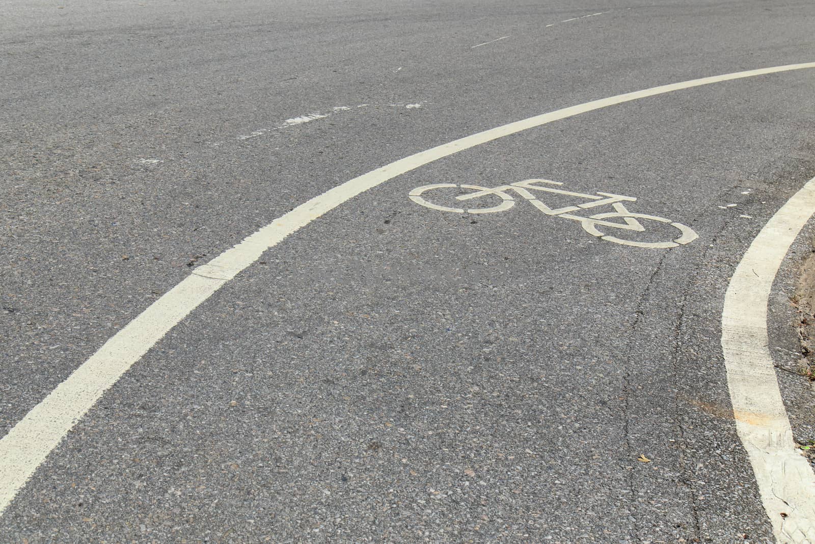 Bicycle sign or icon on the road in the park by nanDphanuwat