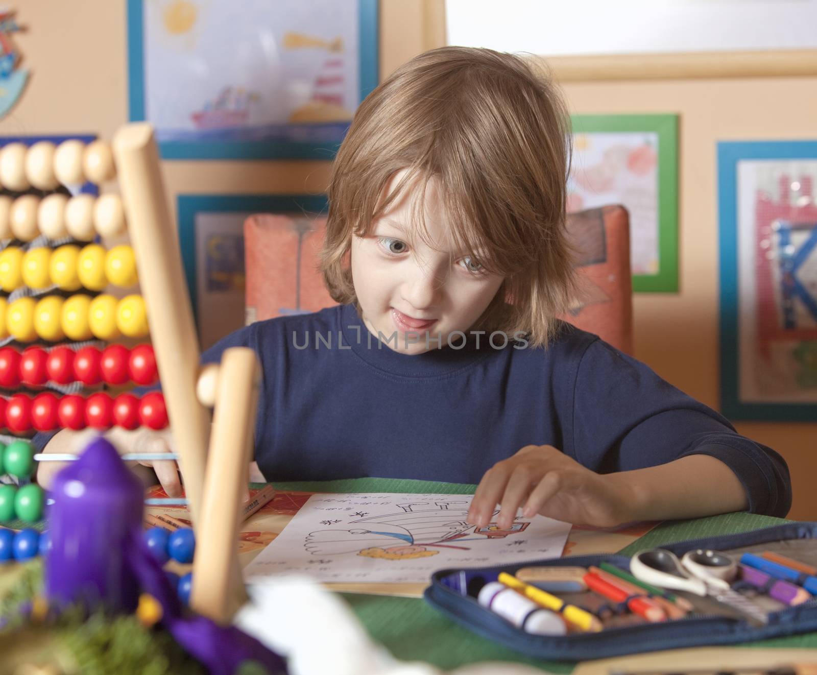 Boy Working on his Homework at Home