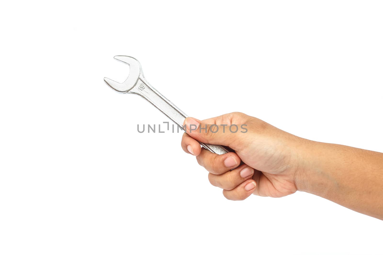 Hand holding wrench isolated on white background