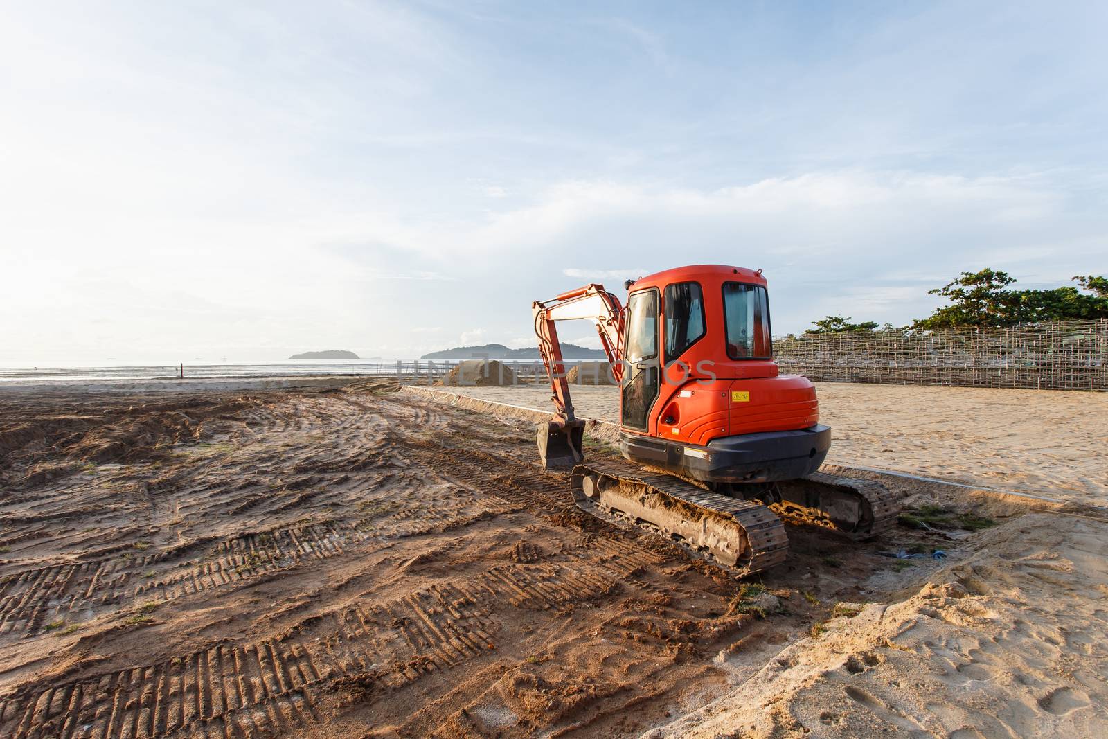 Excavator stand in construction site