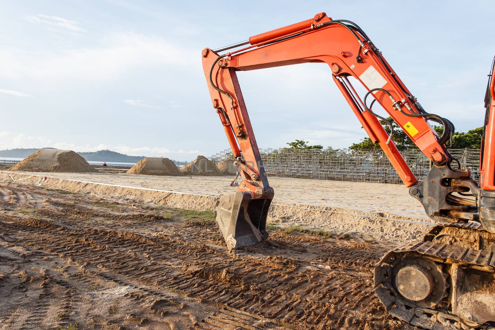 Excavator stand in construction site