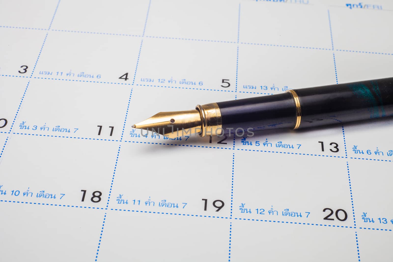 Fountain pen on calenda 
