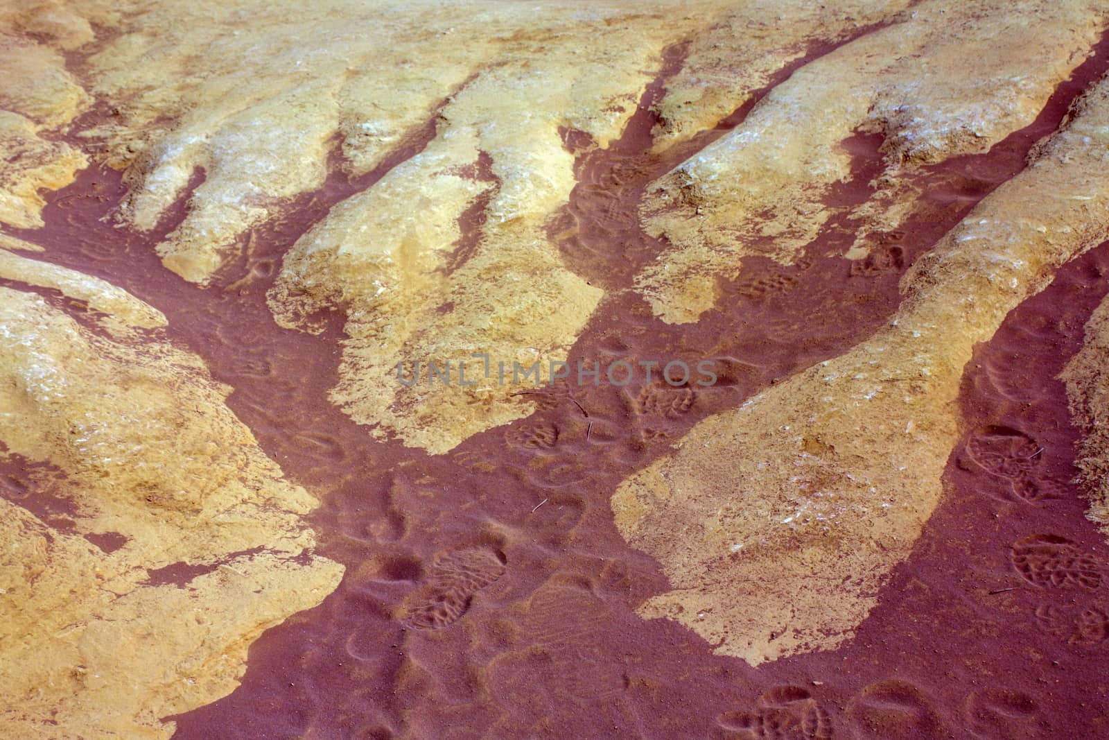 Footprints on red clay by Mag6619