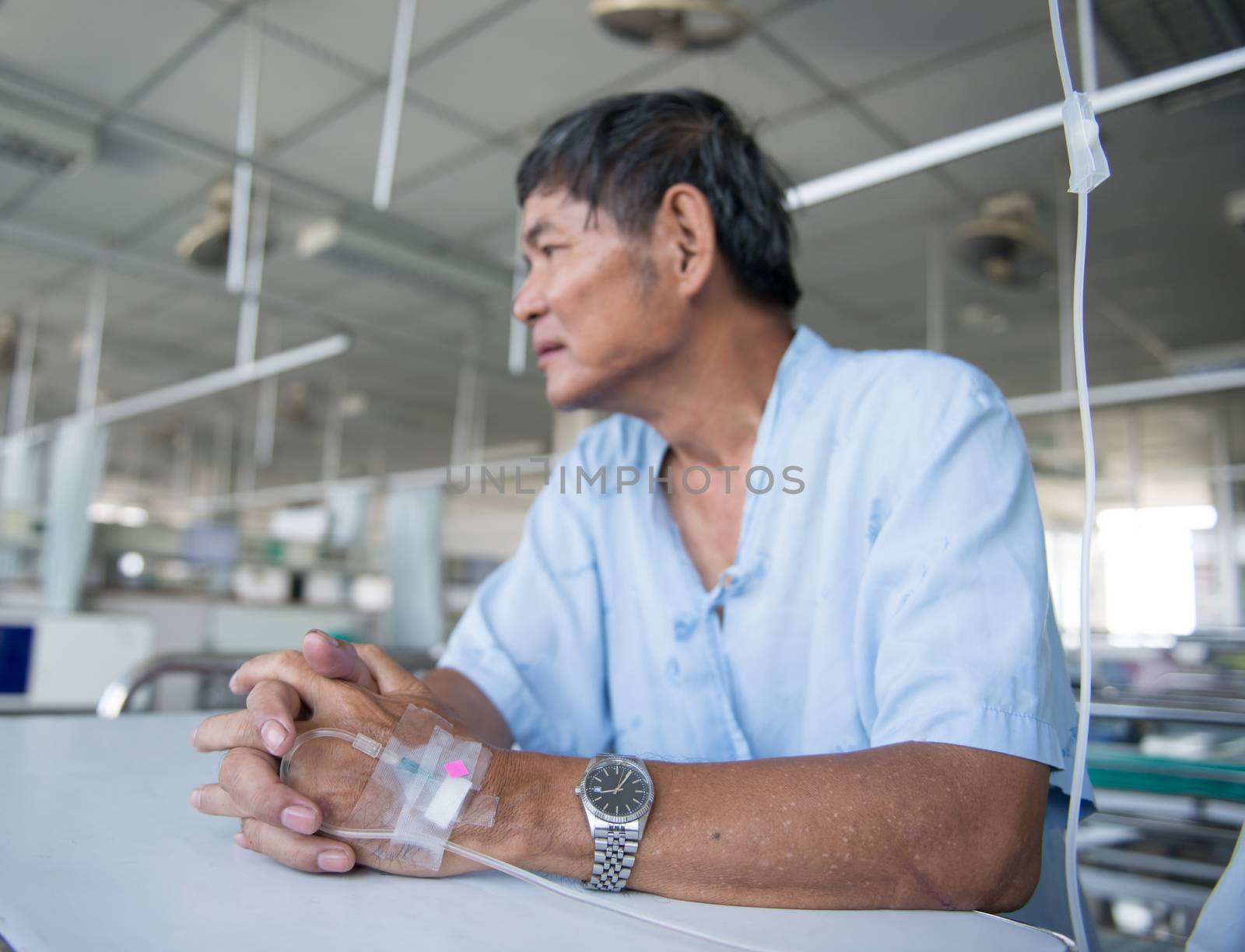 Patient with IV drip in a hospital