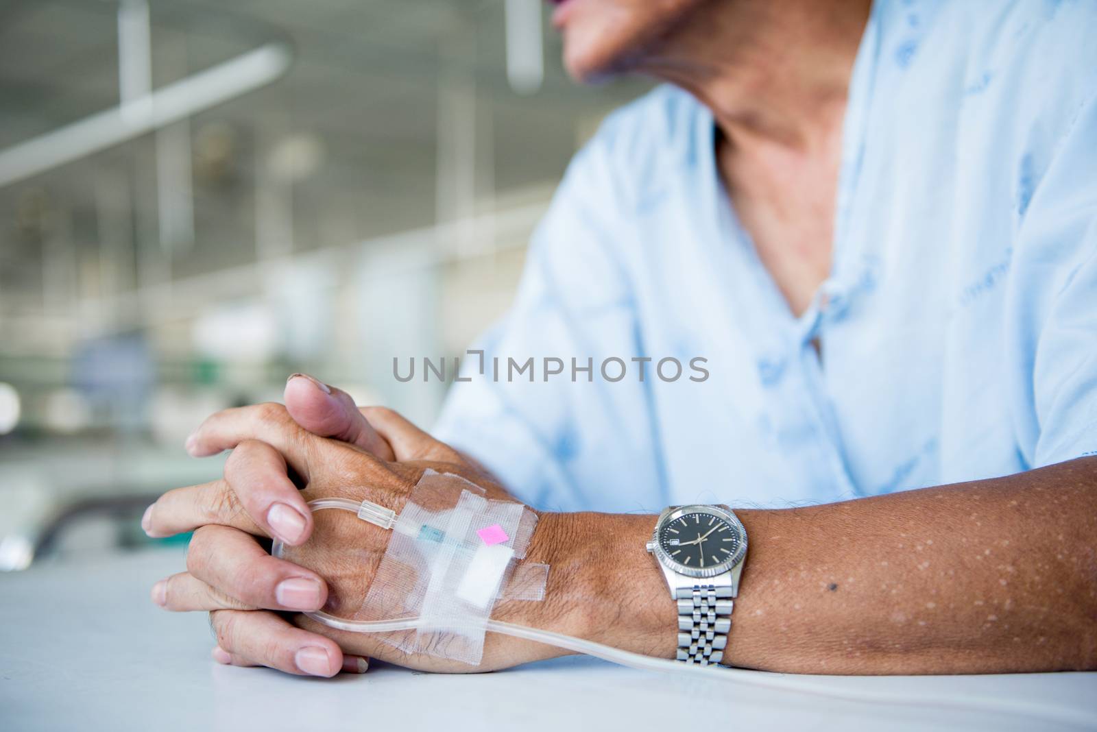 Patient with IV drip in a hospital