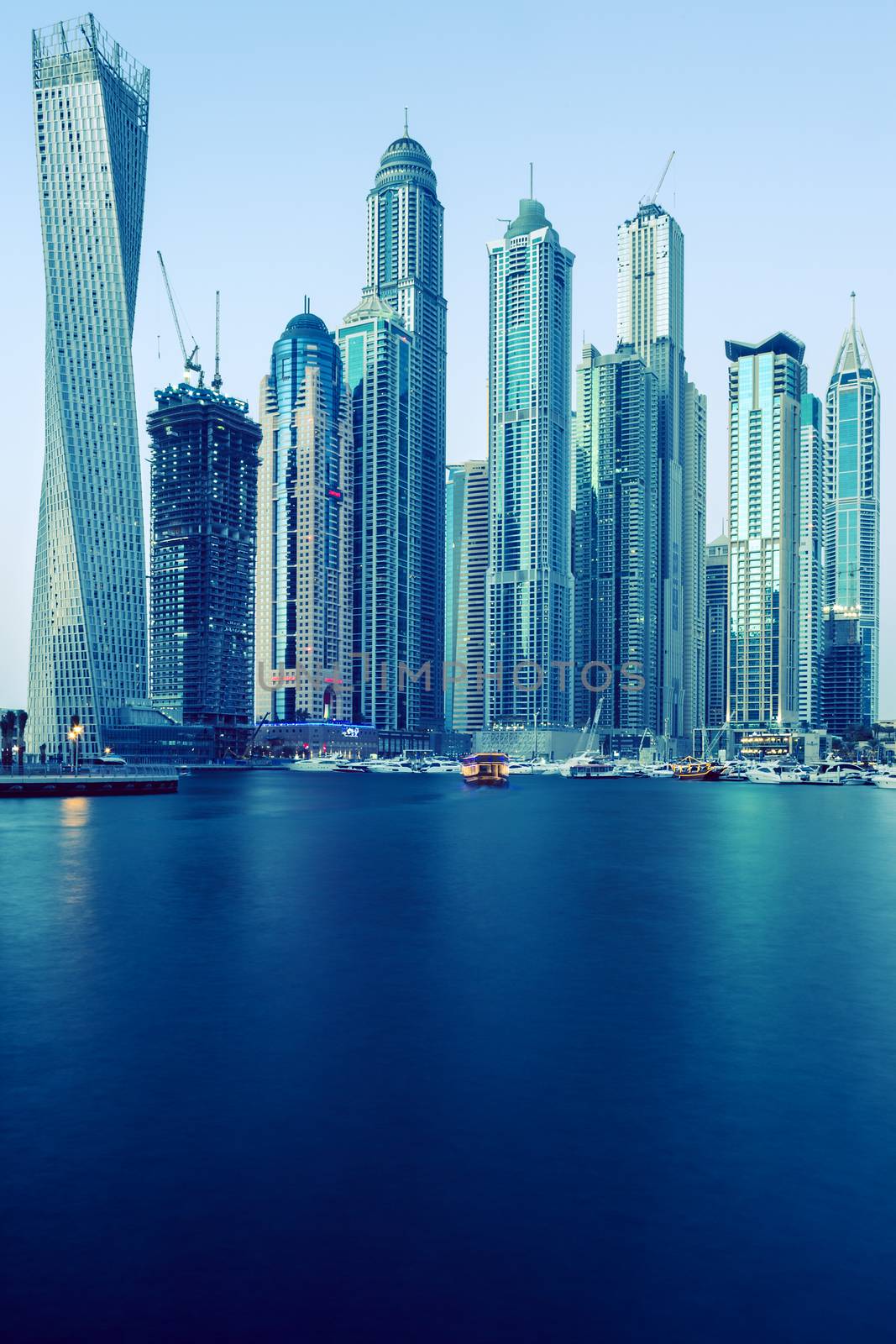 DUBAI, UAE - NOVEMBER 27: Modern buildings in Dubai Marina, Dubai, UAE. In the city of artificial channel length of 3 kilometers, taken on 27 November 2014 in Dubai. 