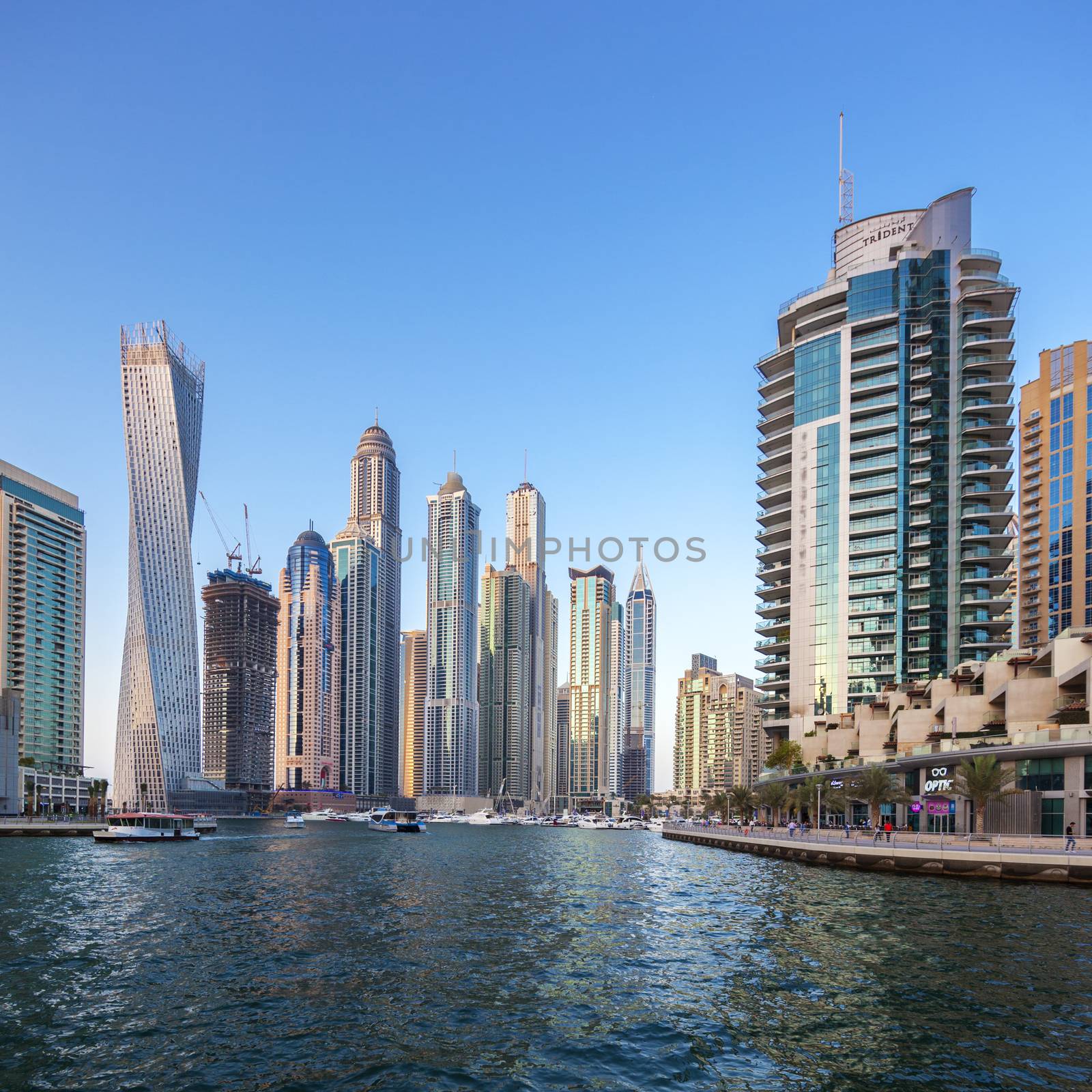 DUBAI, UAE - NOVEMBER 27: Modern buildings in Dubai Marina, Dubai, UAE. In the city of artificial channel length of 3 kilometers along the Persian Gulf, taken on 27 November 2014 in Dubai. 