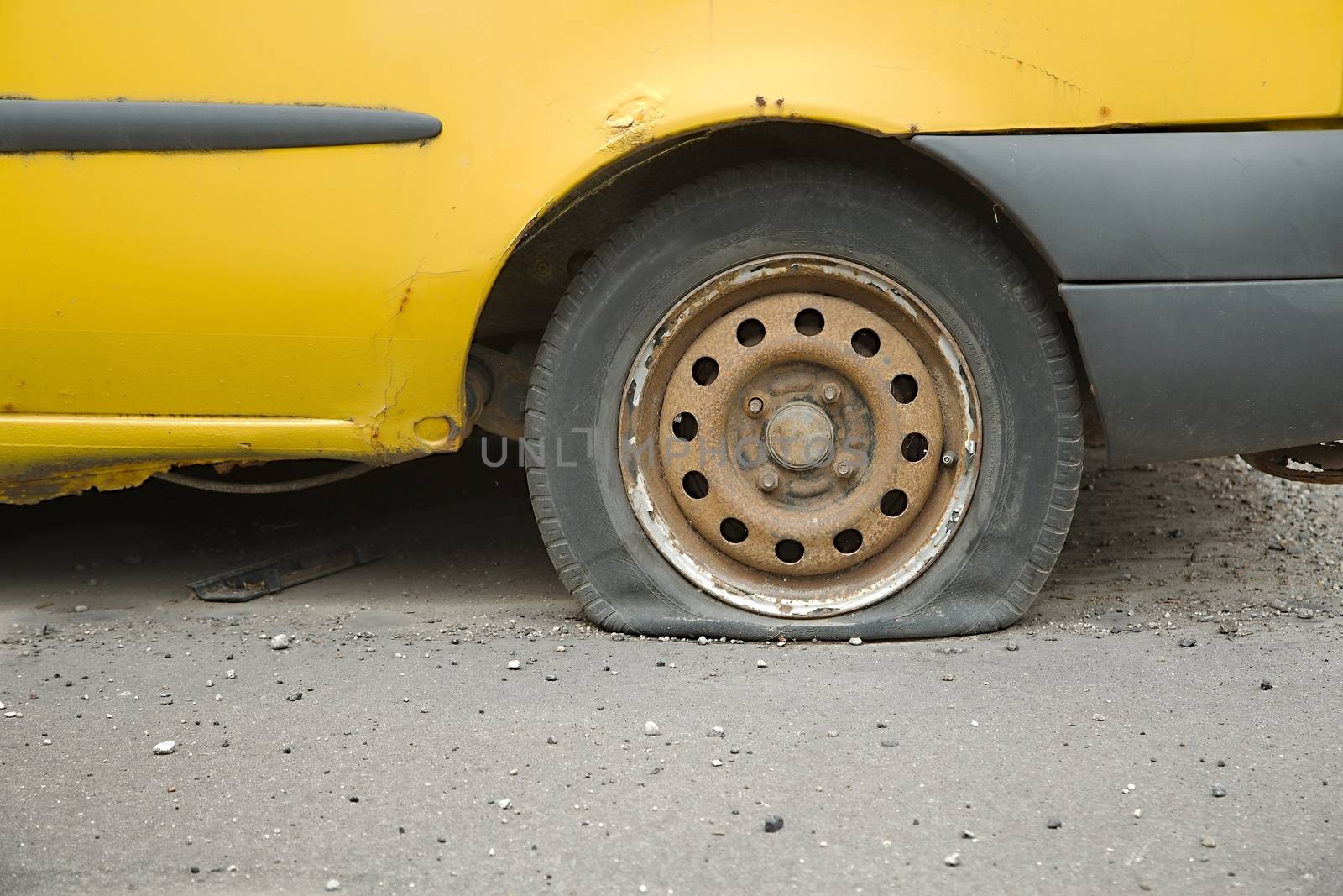 Flat tire of an old car