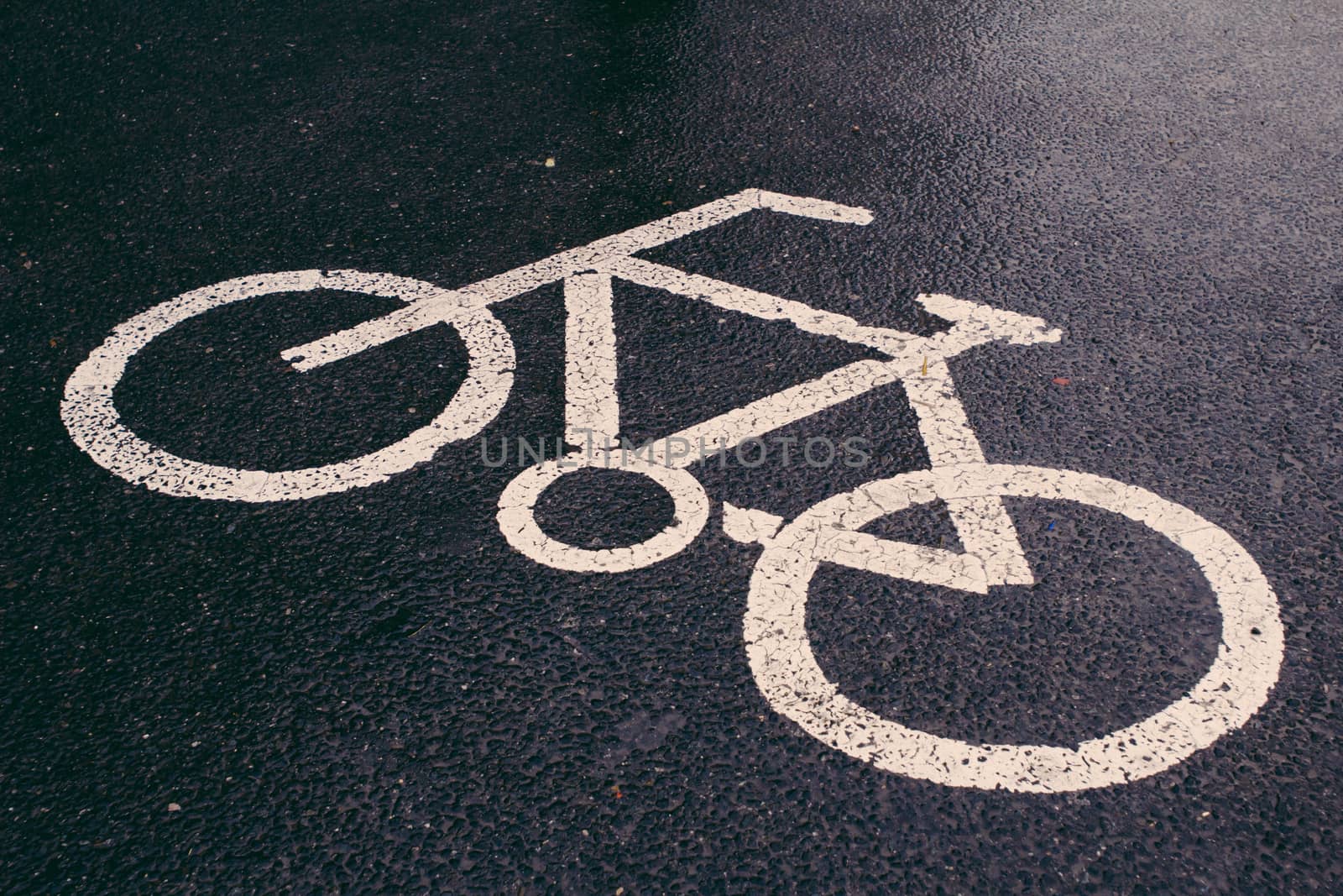 Bicycle sign on the road after the rain,Beijing