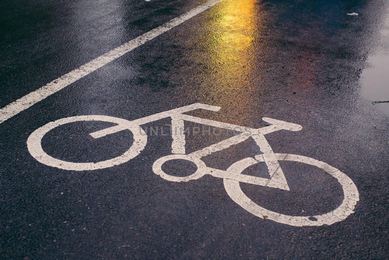 Bicycle sign on the road after the rain,Beijing