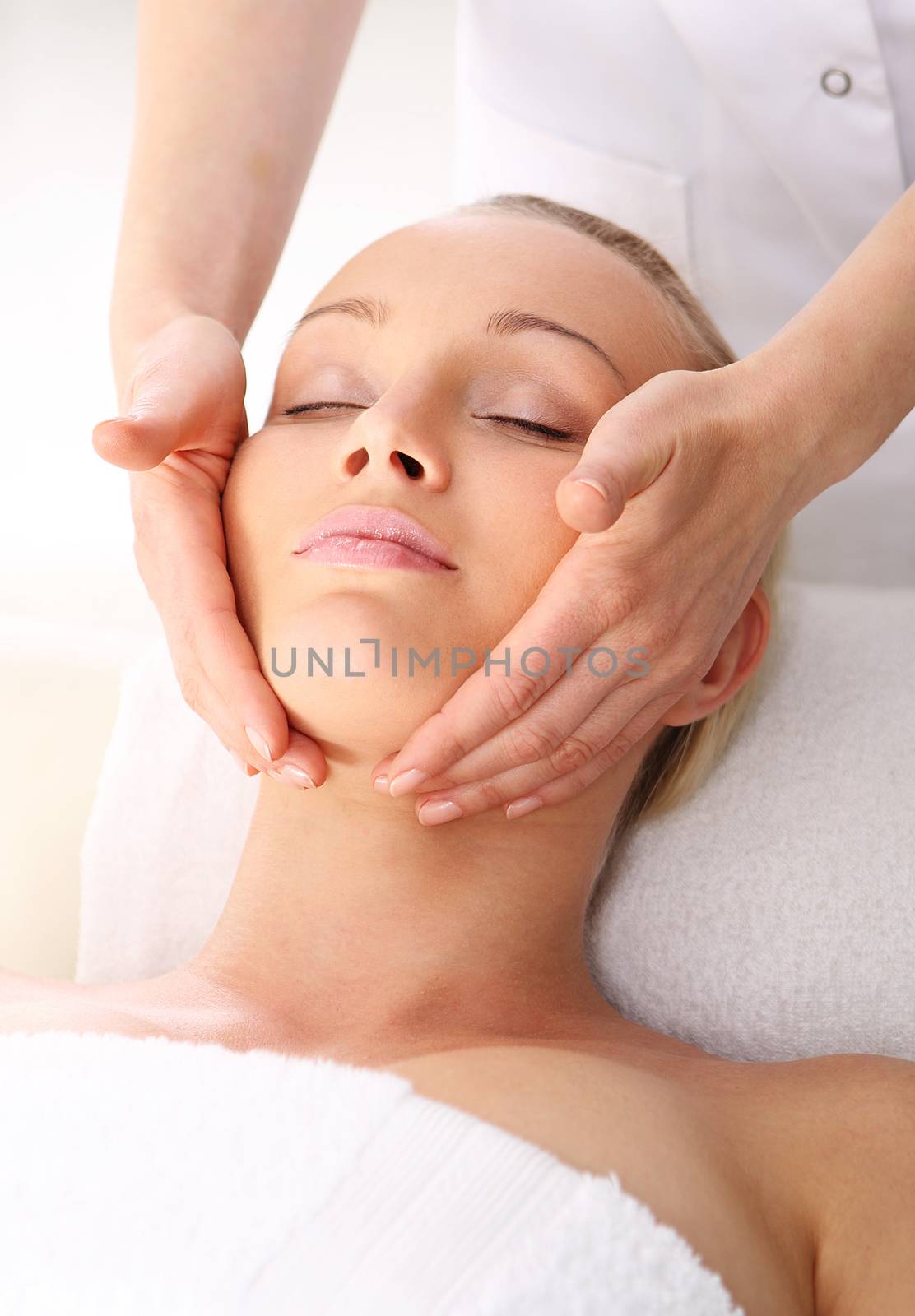 Portrait of a beautiful woman in a beauty salon, relaxation, luxury, peace. by robert_przybysz