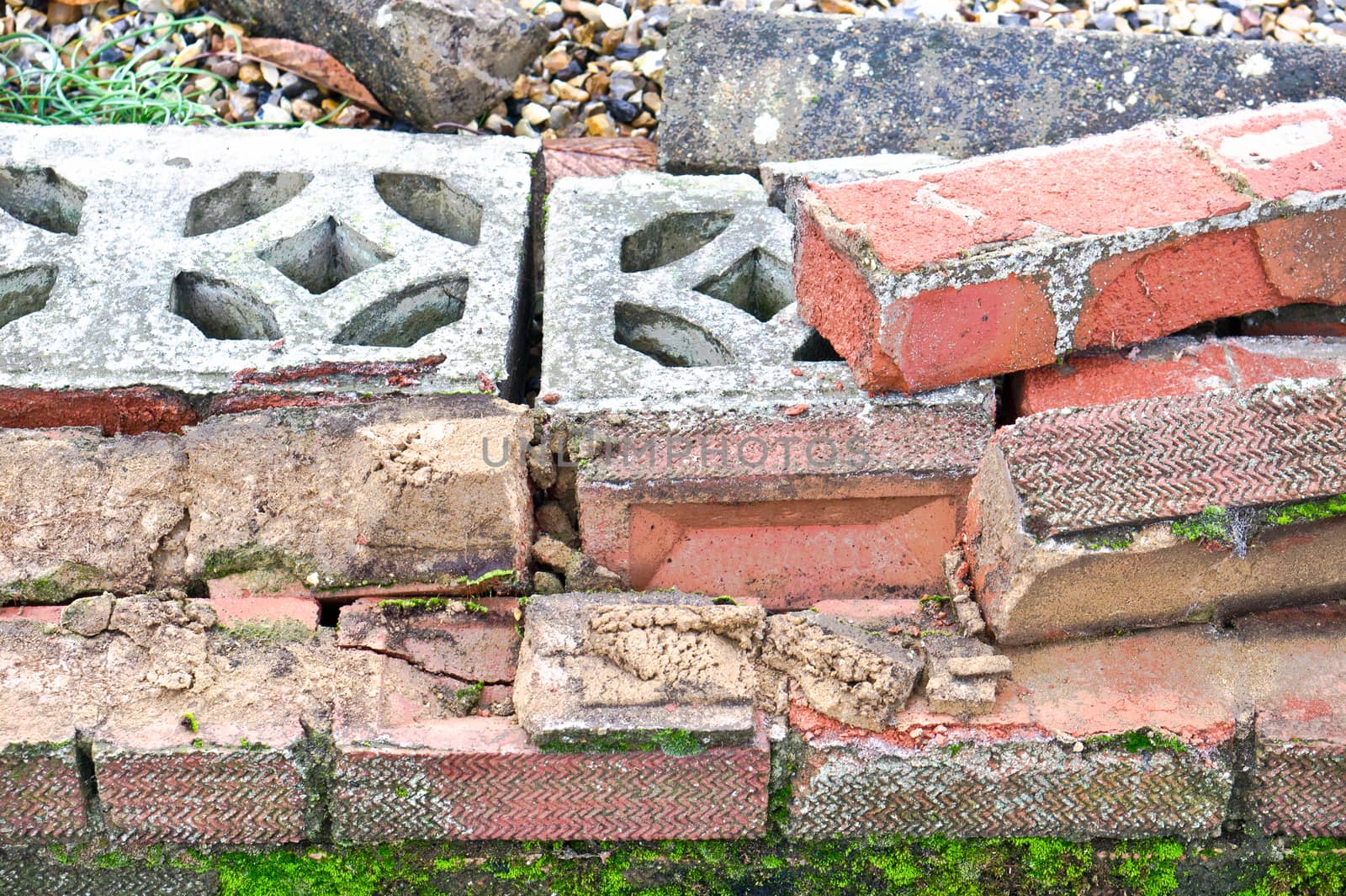 Pile of bricks and rubble from a collapsed wall