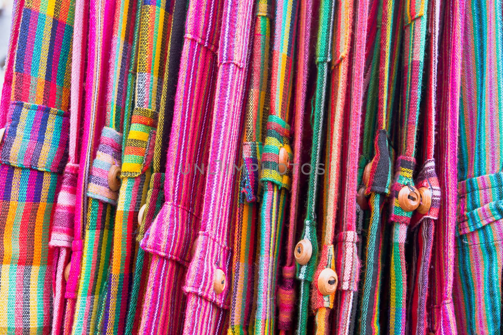 Colorful trousers on sale at a market