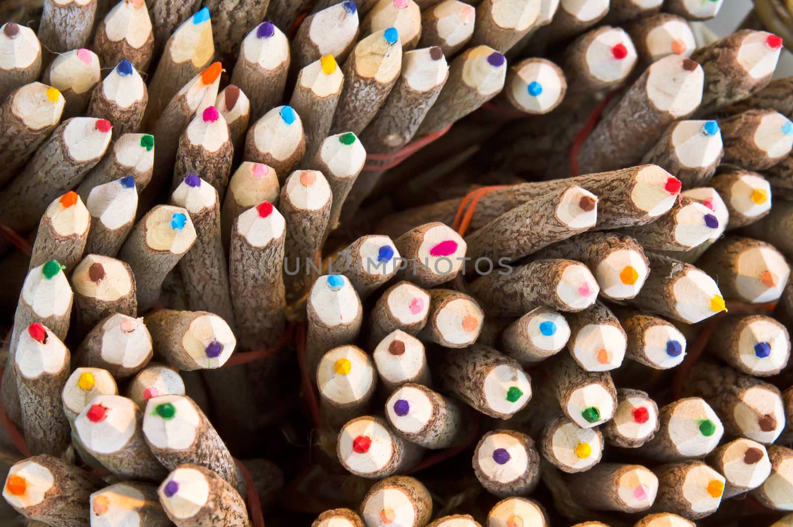 Tips of colorful pencils as a background image