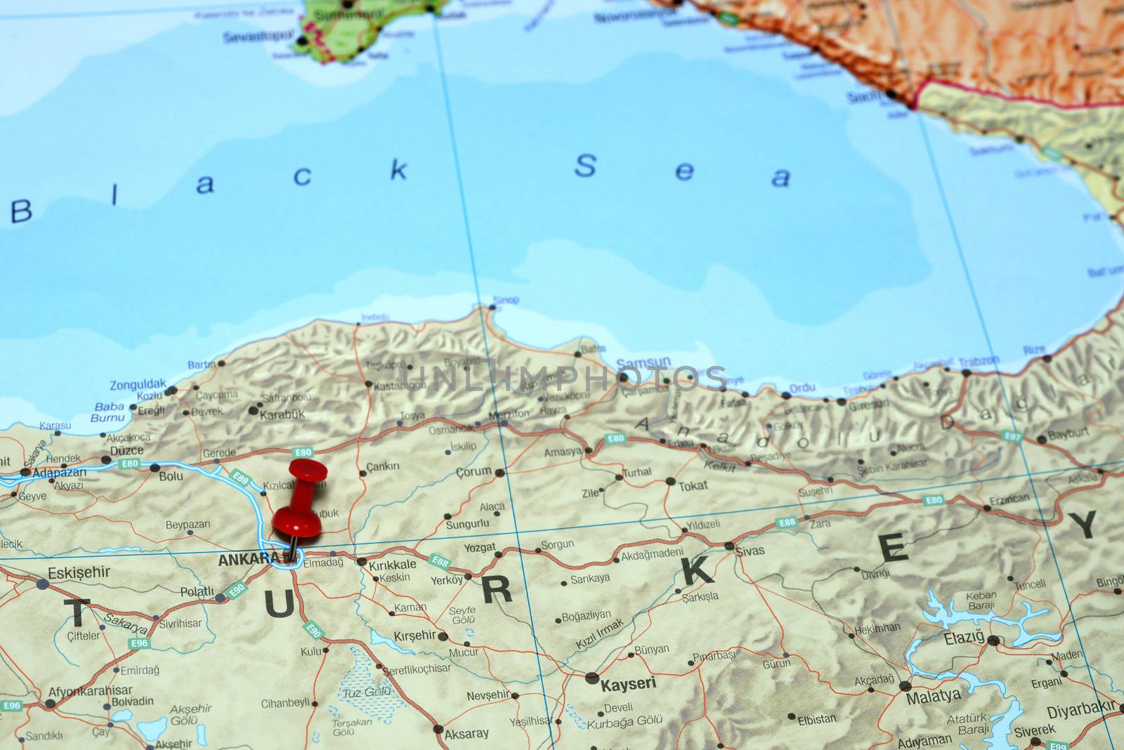 Photo of pinned Ankara on a map of europe. May be used as illustration for traveling theme.
