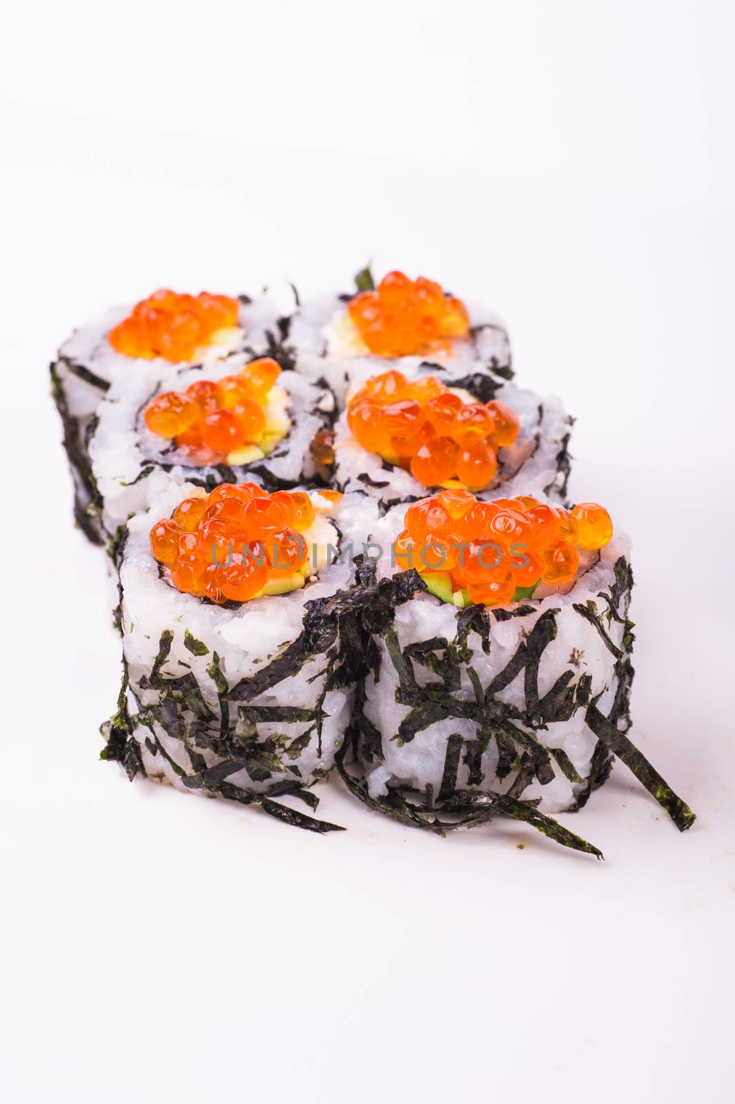 sushi roll in nori with caviar isolated on white background 