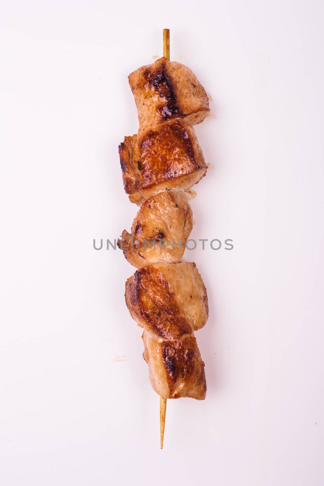 fried pork skewer isolated on white background