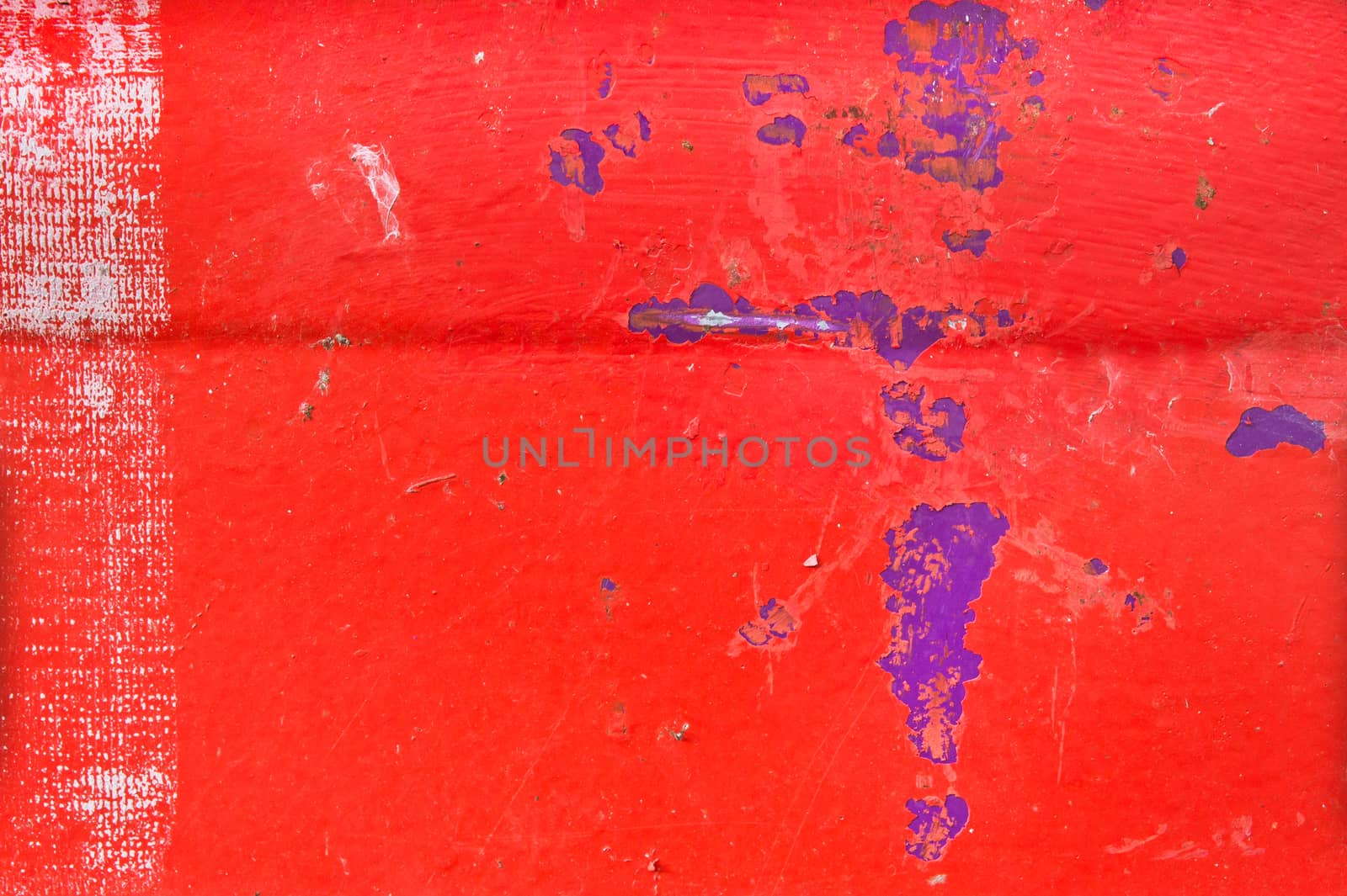 Red metallic background with peeling paint