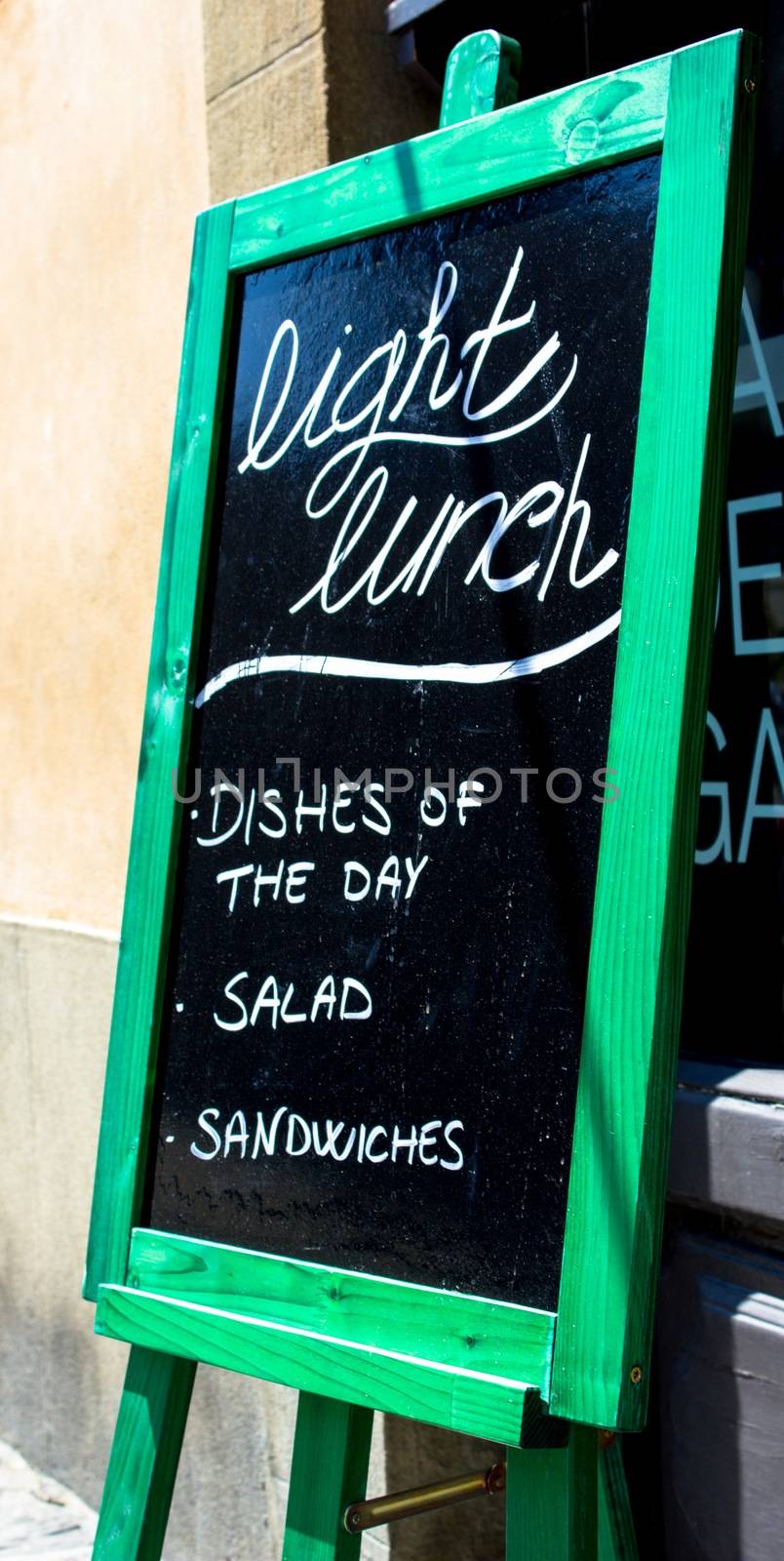 Advertising menu outside a restaurant for tourists