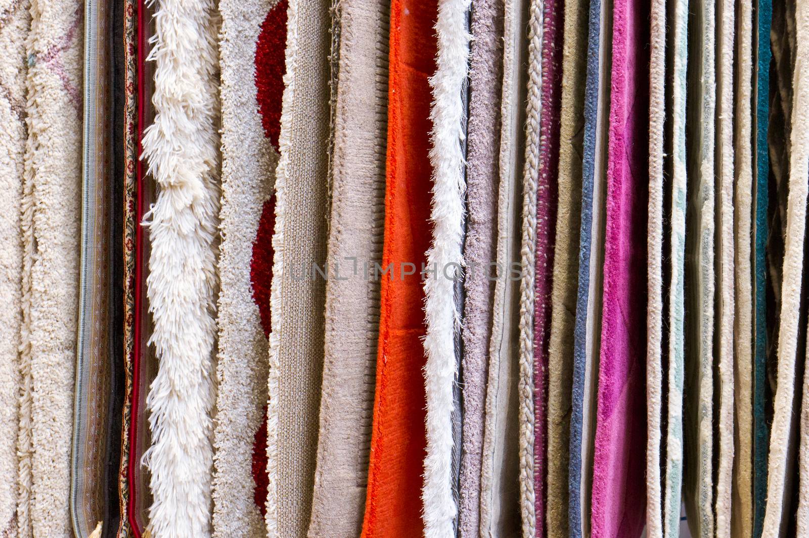 Edges of hanging rugs as a background
