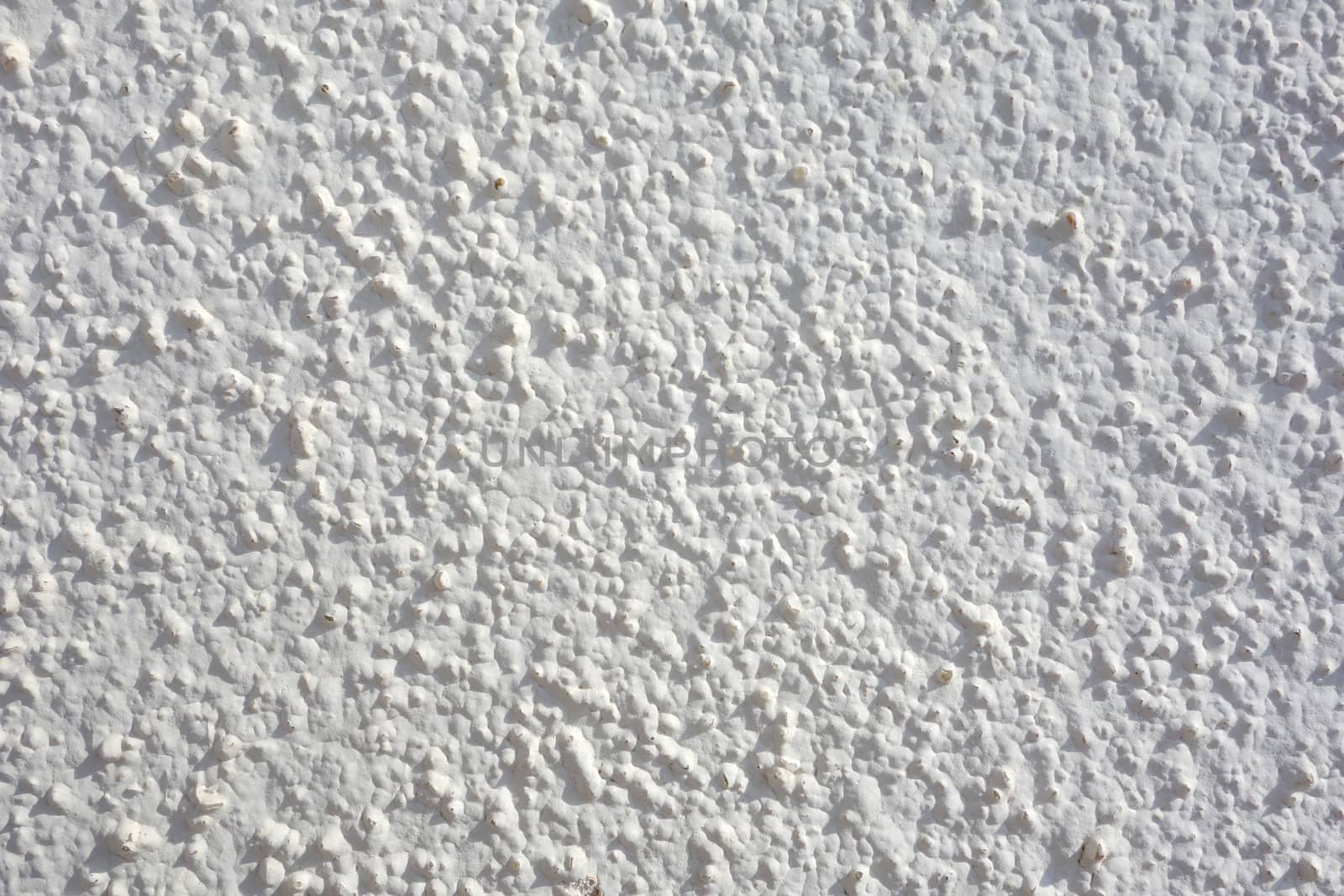 White embossed wall. Concrete wall texture or background