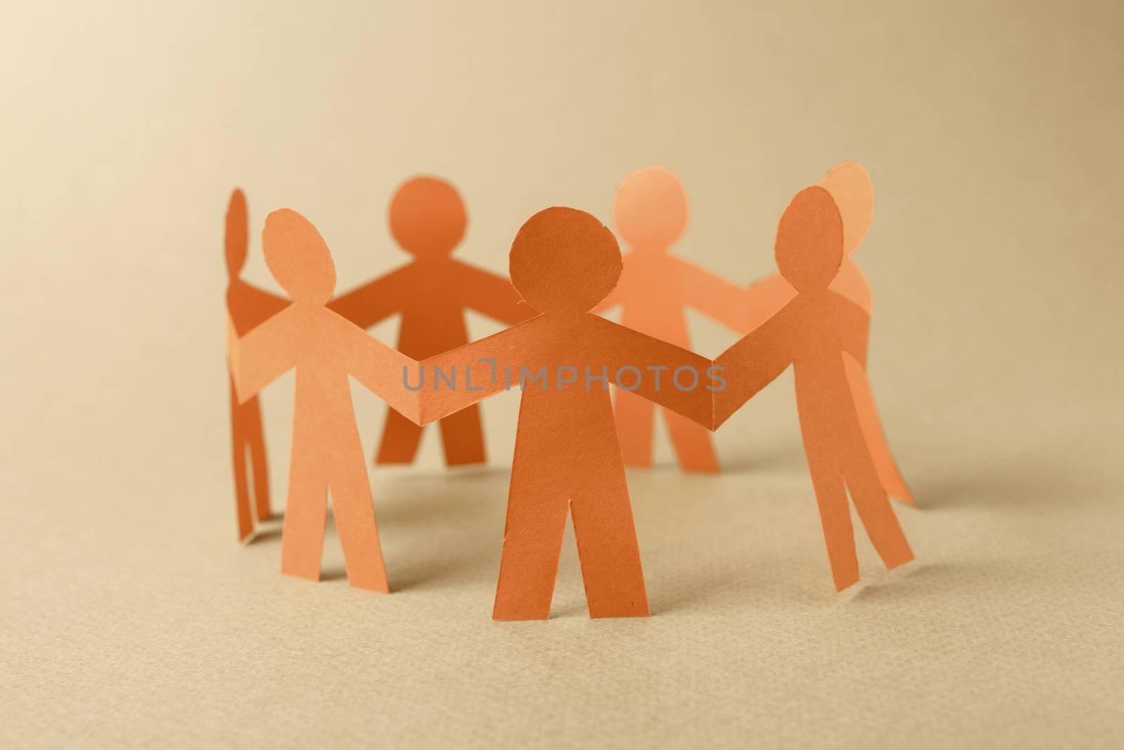 Paper team people linked together. Partnership concept