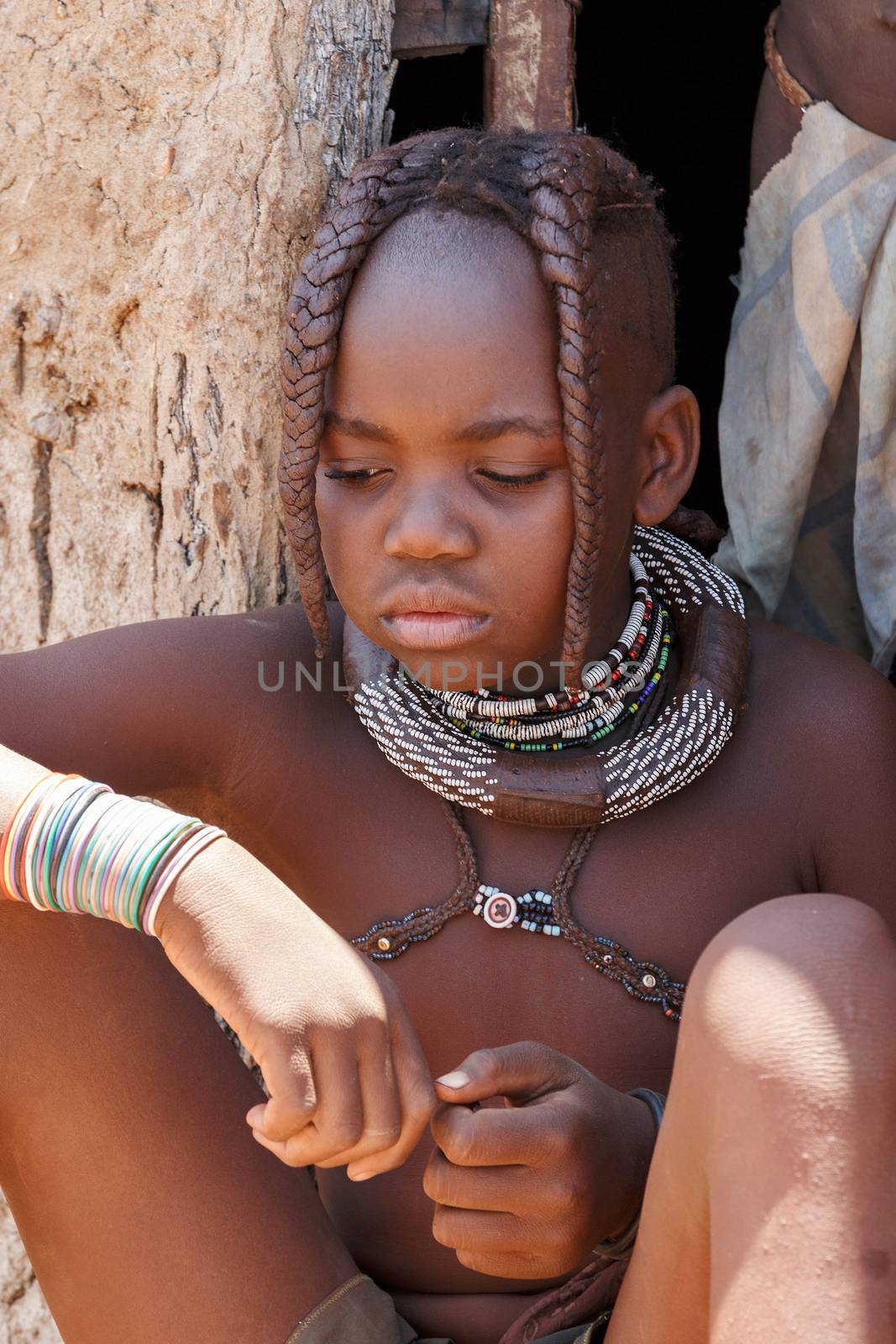 NAMIBIA, KAMANJAB, OCTOBER 10: Unidentified child Himba tribe. The Himba are indigenous peoples living in northern Namibia, in the Kunene region of South-West Africa on october 10 2014