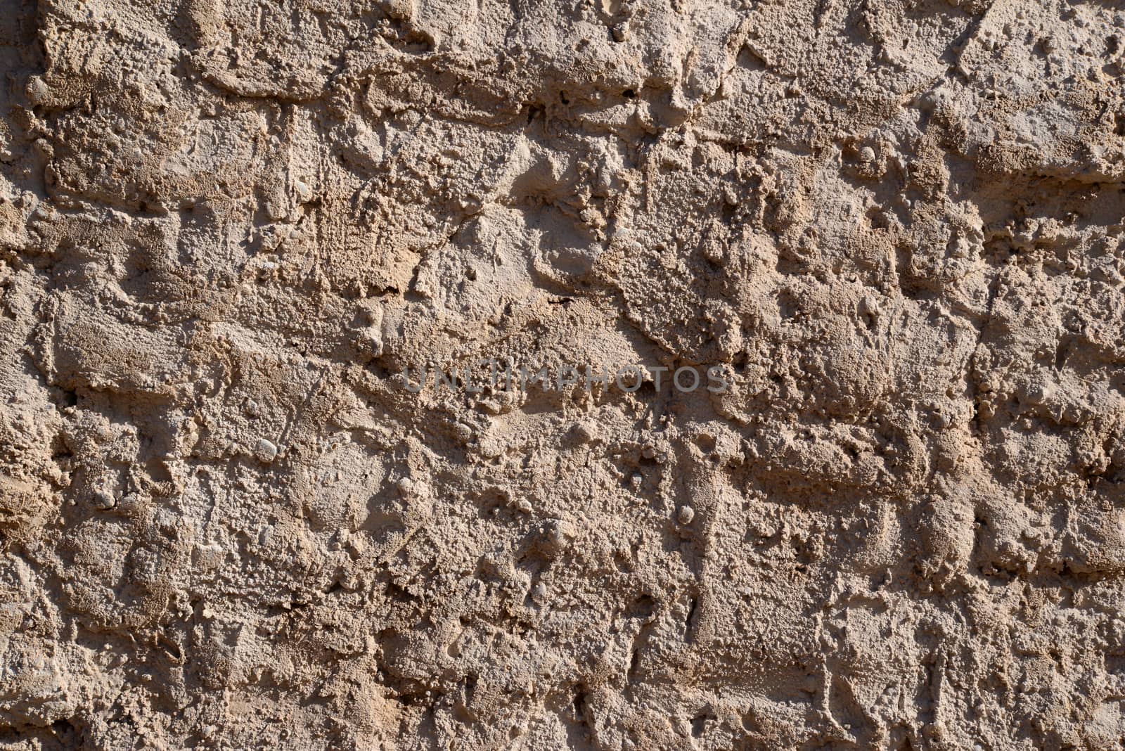 Photo of messy and aged wall. May be used as texture or background.