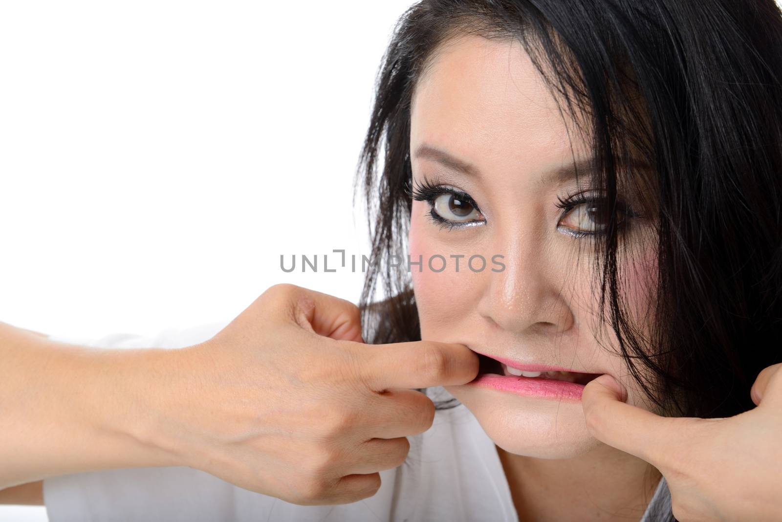 crazy woman pull her mouth with both hand