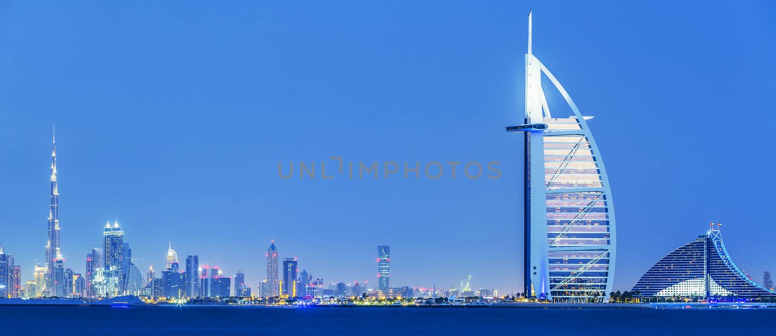 View of Dubai skyline by night, UAE. 