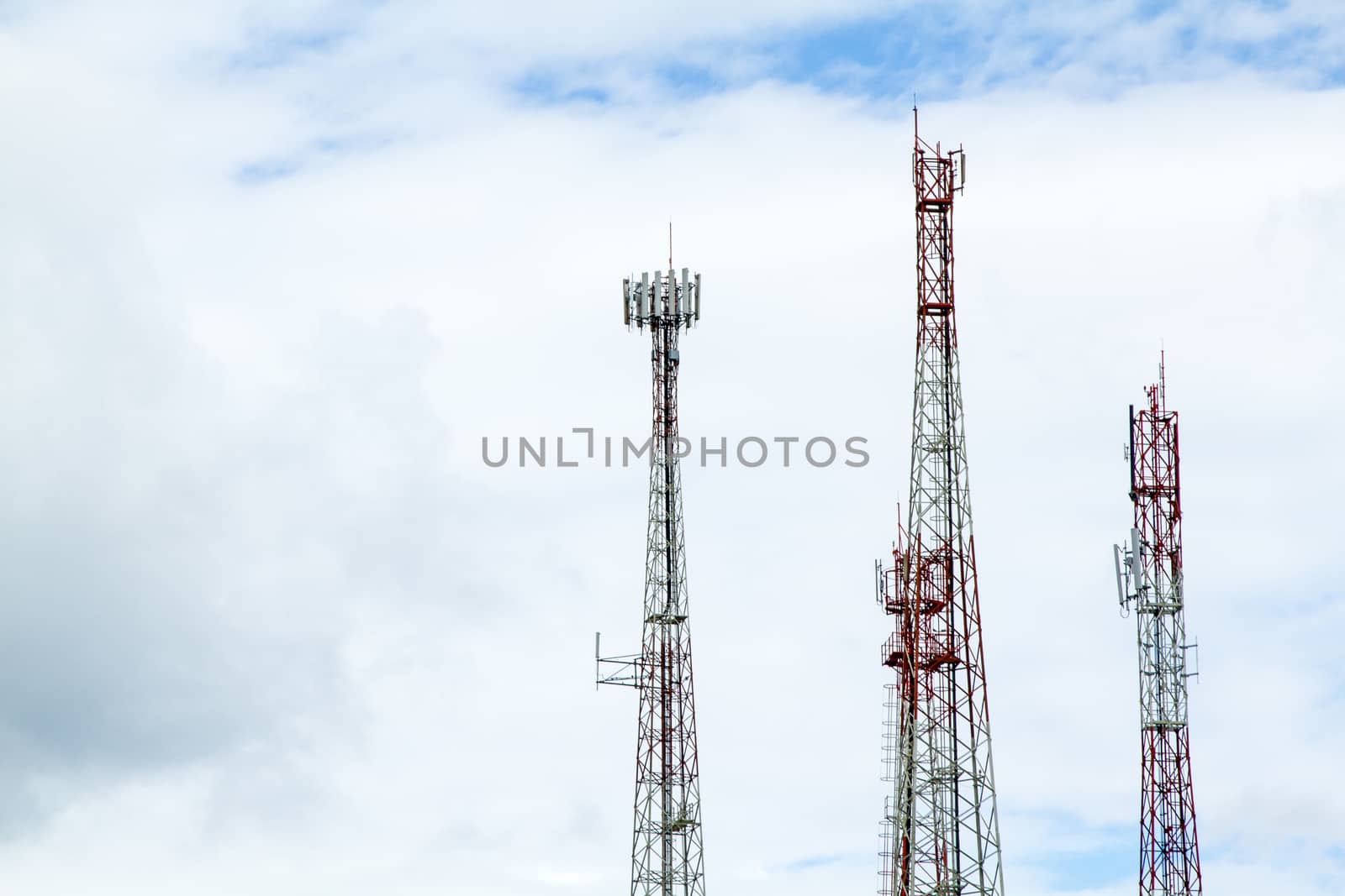 Communication tower over a blue sky background