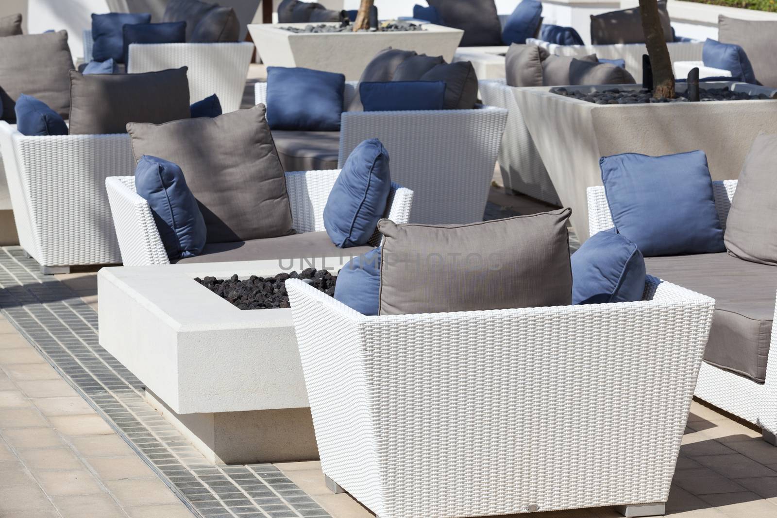 outdoor furniture rattan armchairs and table on terrace 