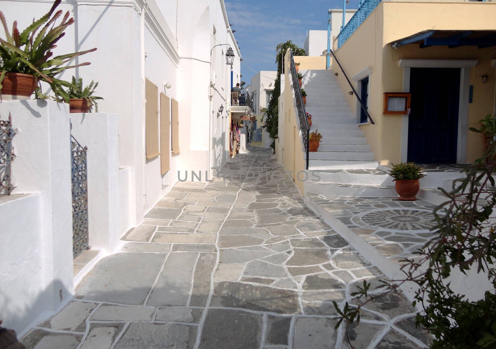 A view of a narrow alley in Paros Island, Greece.

Picture taken on August 29, 2011.