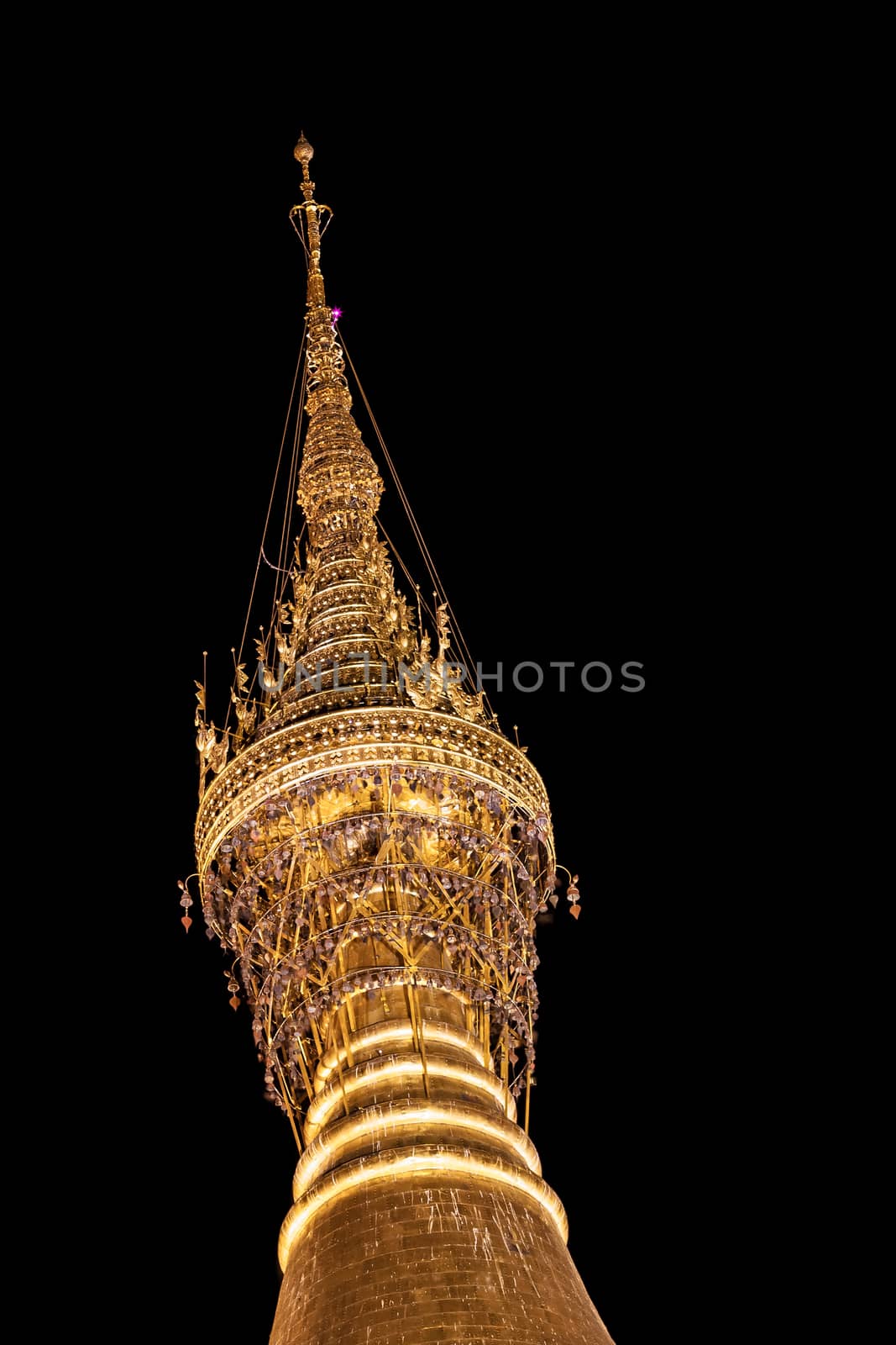 The top of Shwedagon pagoda in Yangon at night, Myanmar