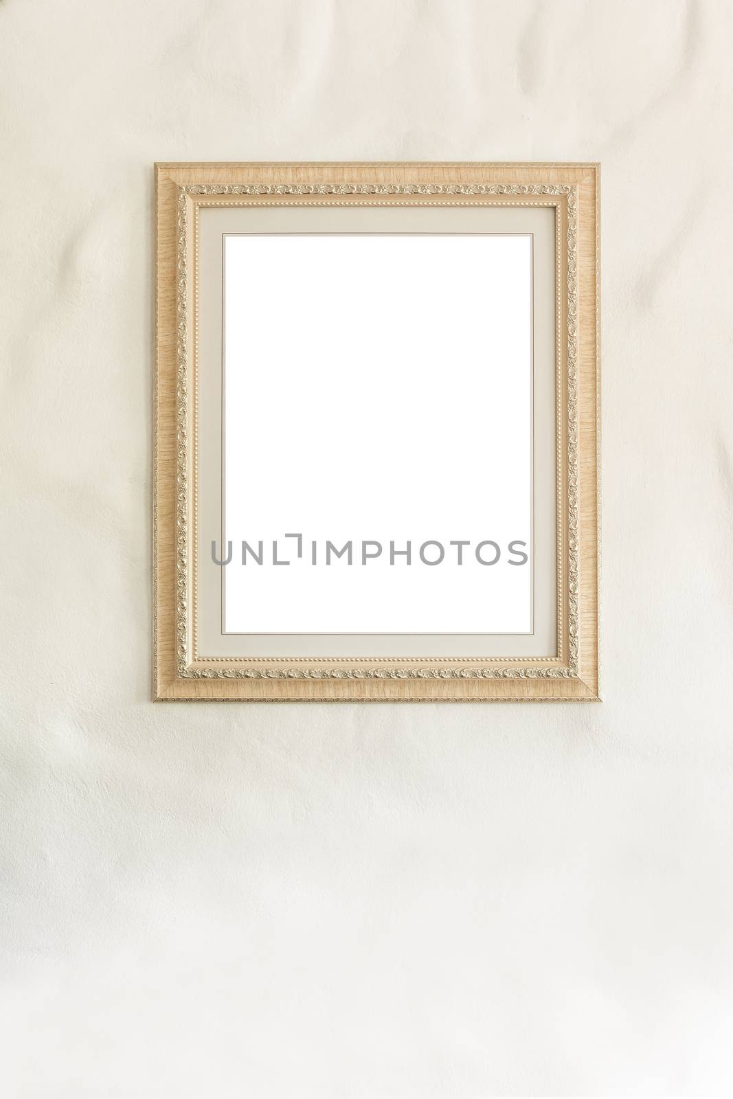 blank photo frame on white wall background