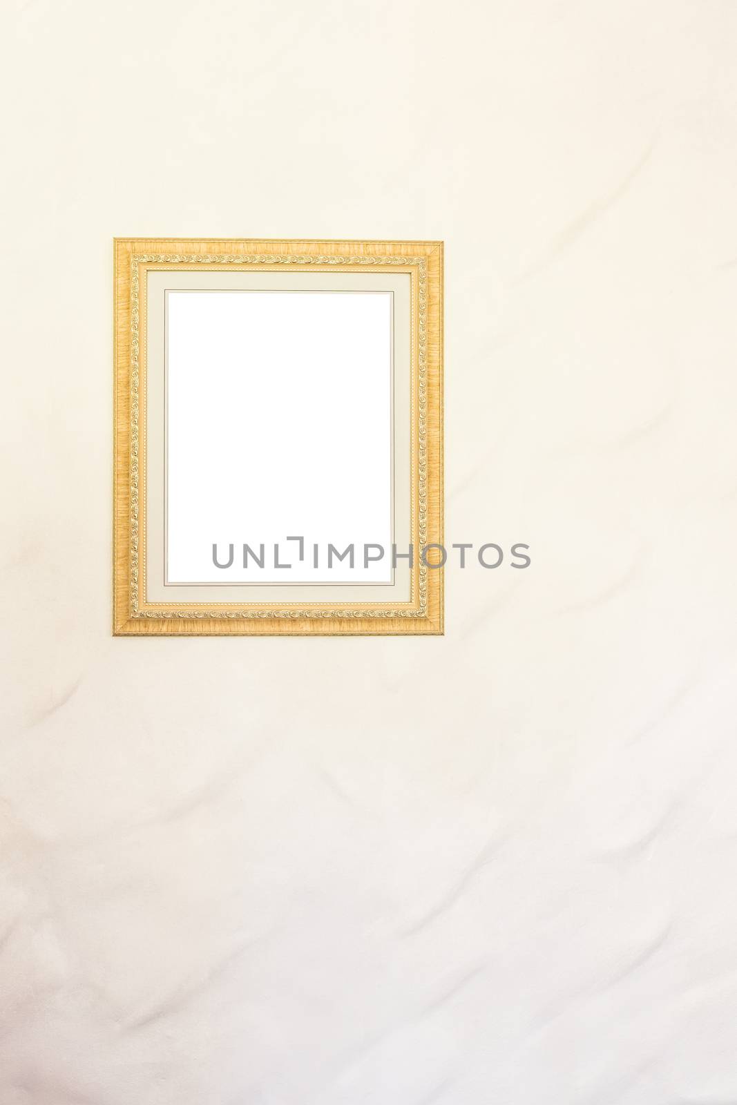 blank photo frame on white wall background