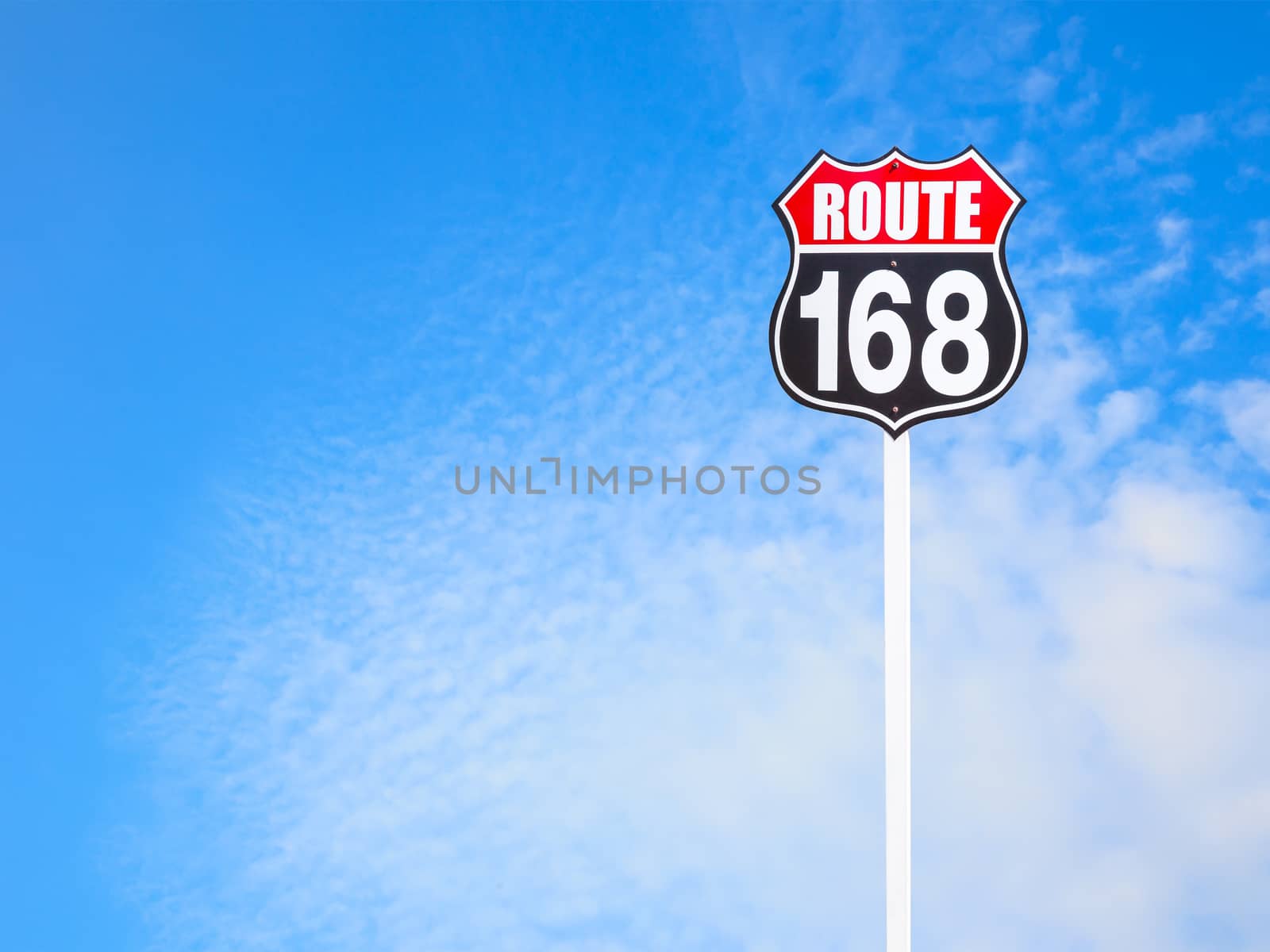 vintage route 168 road  sign and blue sky