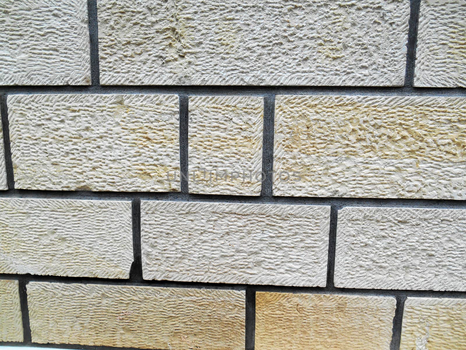 A close up of a stone - built wall.

Picture taken on November 14, 2014.