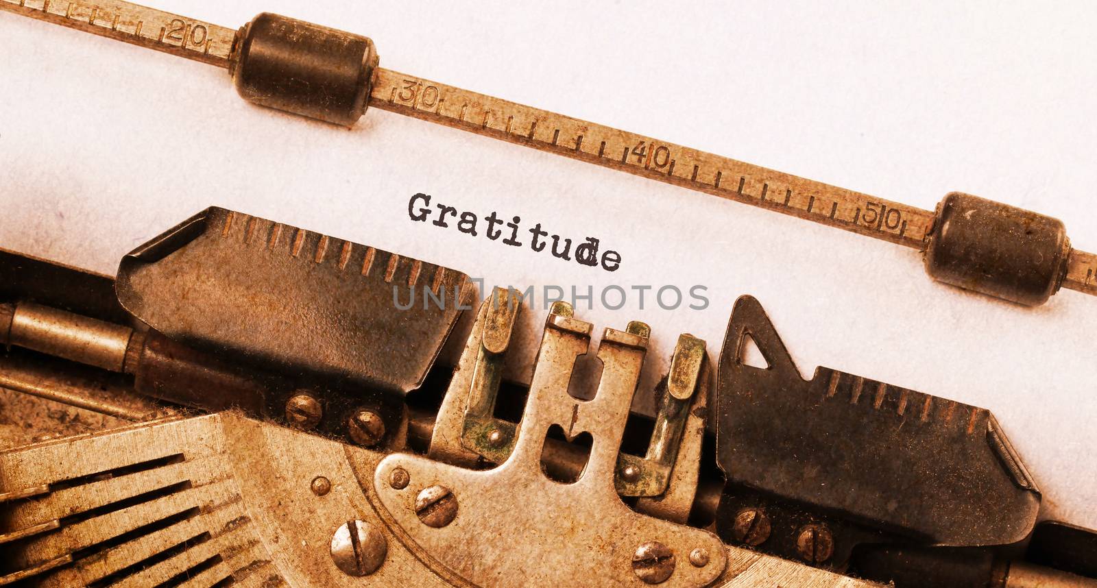 Vintage typewriter, old rusty, warm yellow filter, gratitude